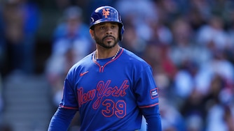 New York Mets' Tommy Pham returns to the dugout after striking out during the ninth inning of a baseball game against the Chicago Cubs, Saturday, April 18, 2026, in Chicago. (AP Photo/Erin Hooley)