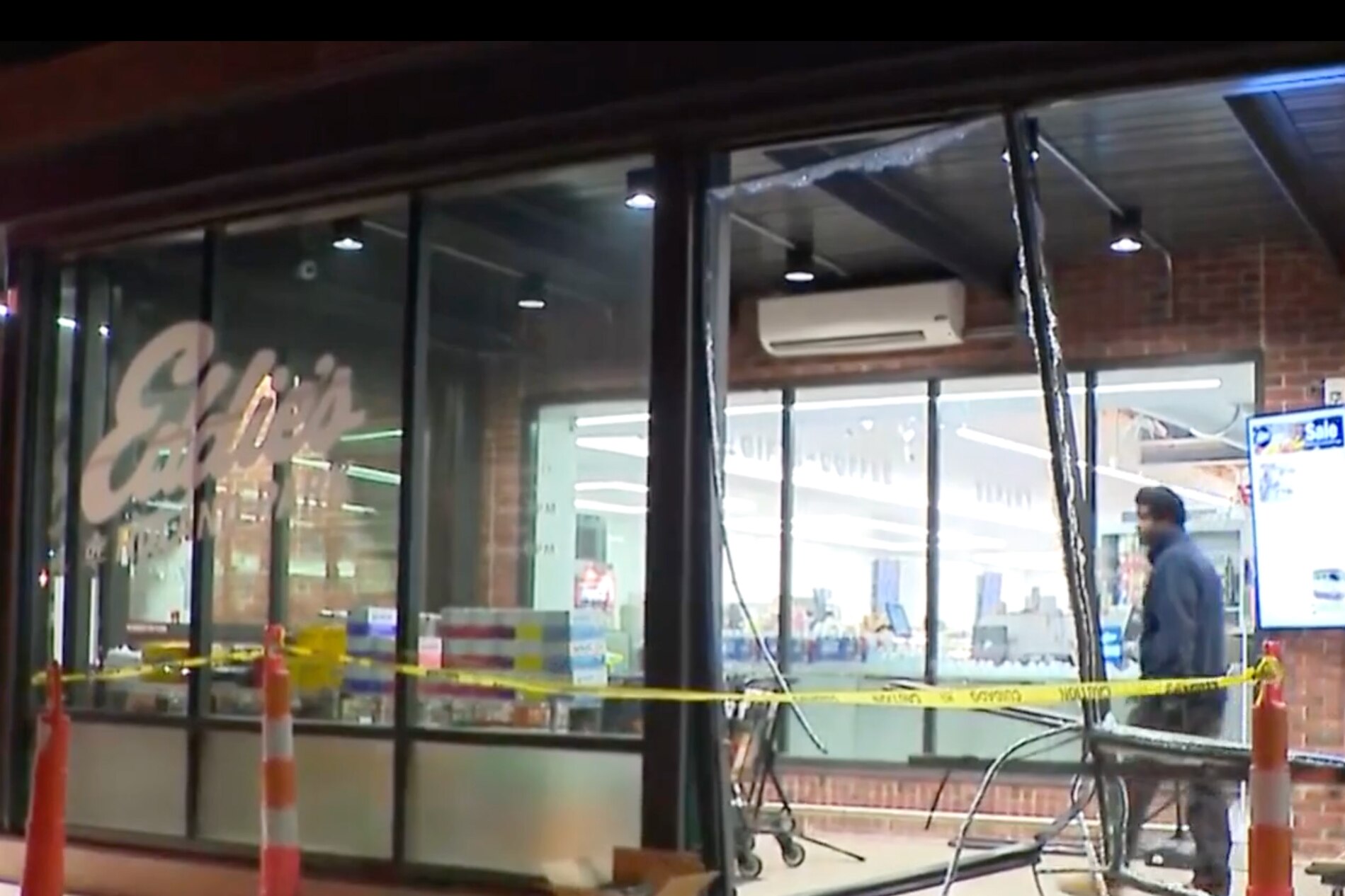 Wreckage after a driver crashed a vehicle into Eddie's of Roland Park.