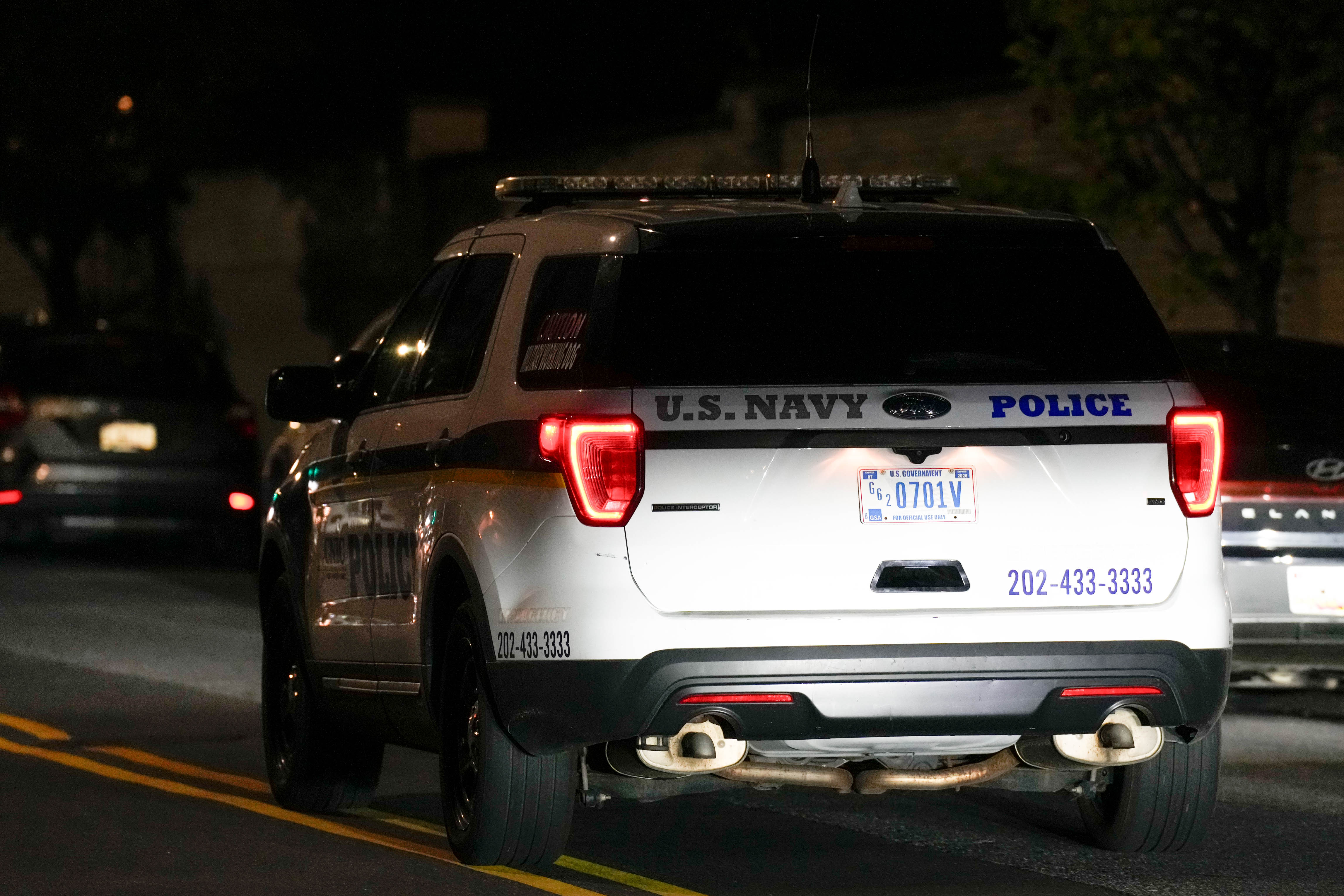 A U.S. Navy Police vehicle leaves the United States Naval Academy in Annapolis on Thursday, Sept. 11, 2025. The USNA went on lockdown Thursday evening following reports of a shooting on campus.