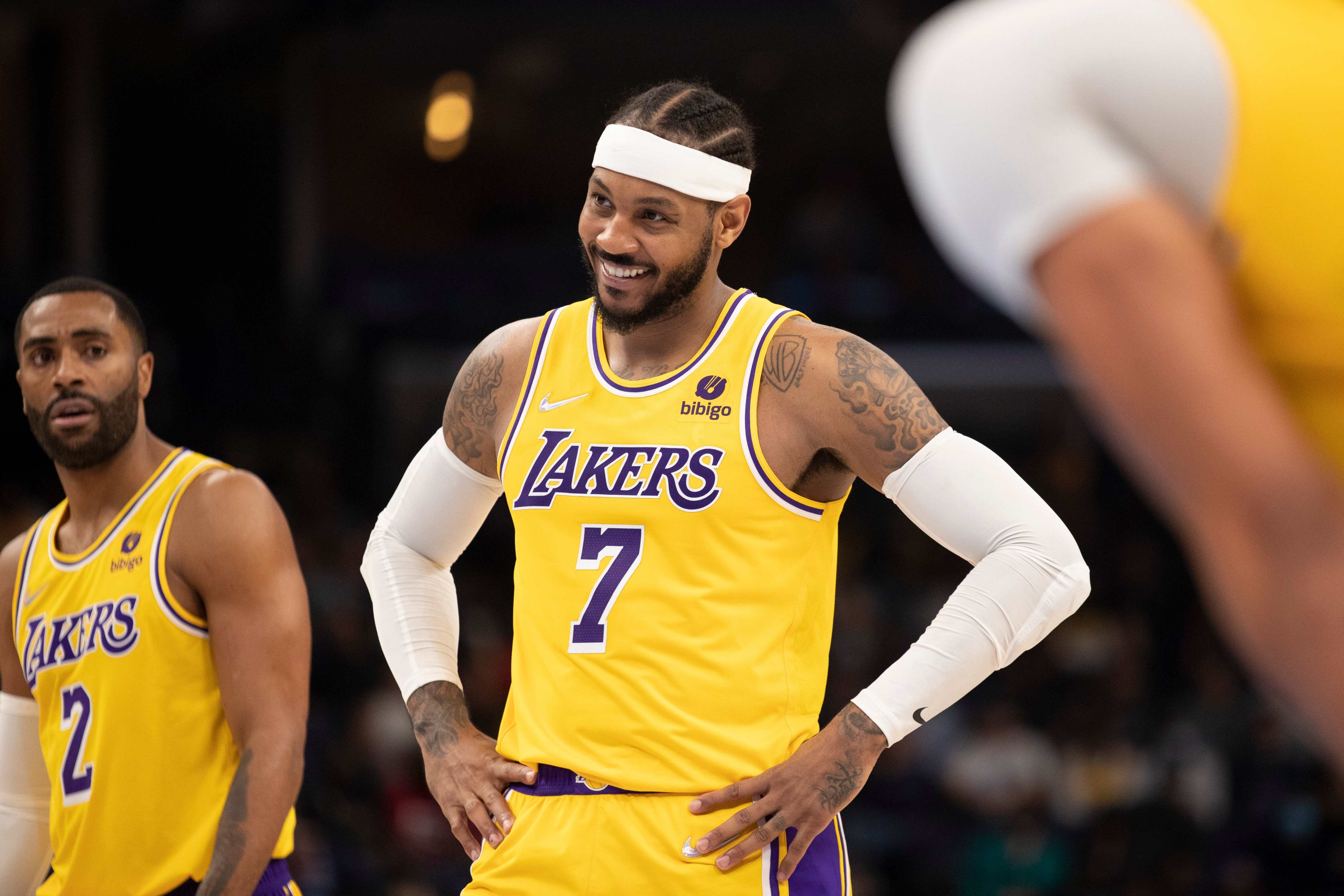 Los Angeles Lakers forward Carmelo Anthony (7) smiles during the second half of the team's NBA basketball game against the Memphis Grizzlies on Thursday, Dec. 9, 2021, in Memphis, Tenn.