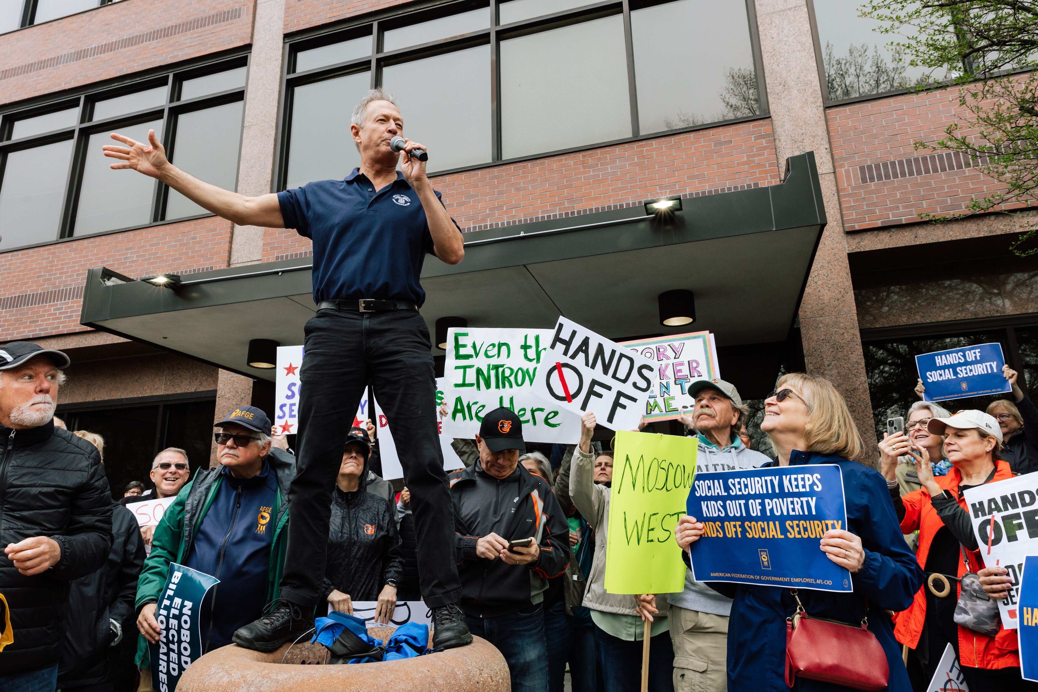Former Maryland Gov. Martin O’Malley addresses a crowd of protesters outside at the Social Security Administration headquarters in Woodlawn on Saturday.
