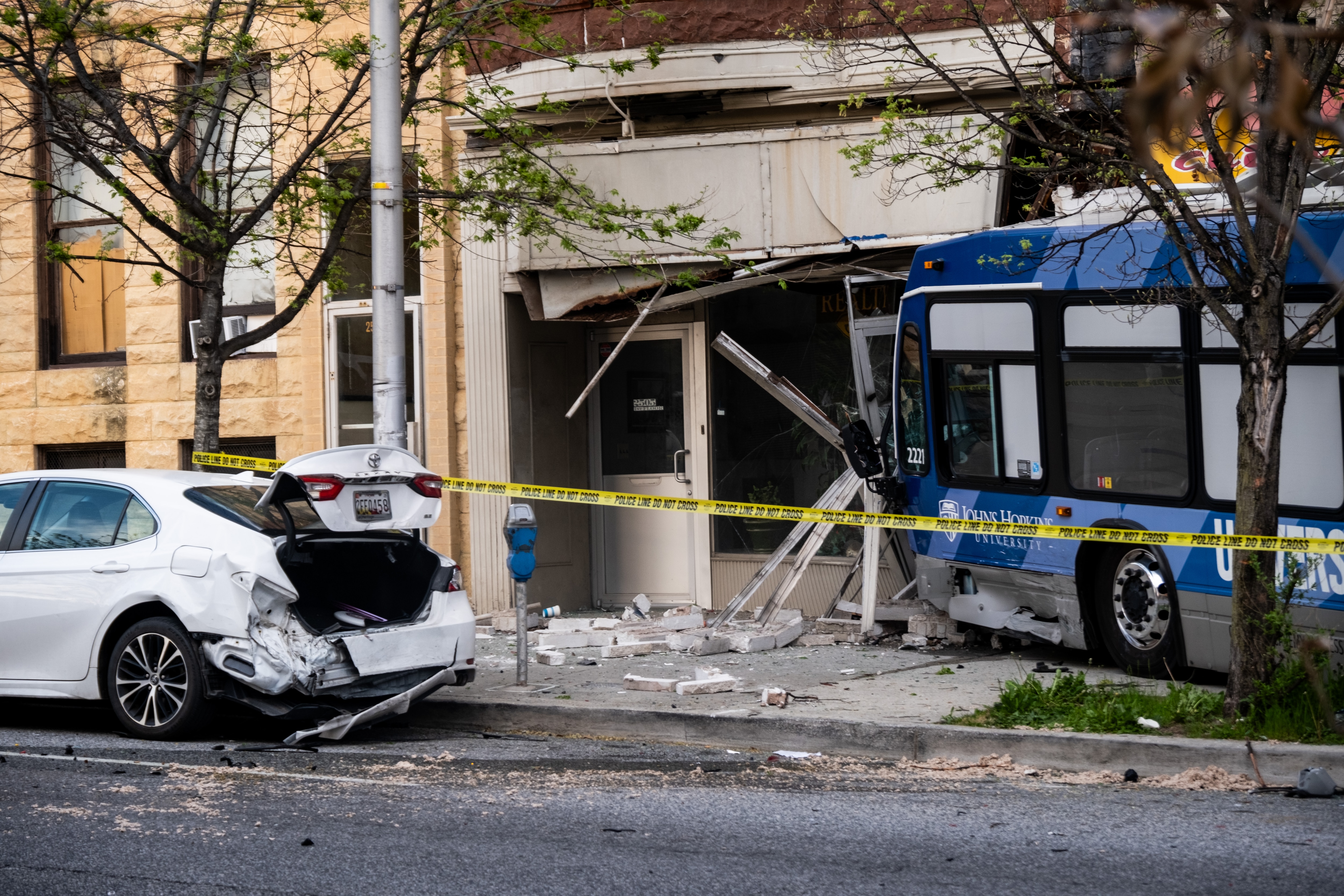 A Johns Hopkins University bus crashed into a building on N. Charles Street at 25th Street in Baltimore after a multi-vehicle accident on Saturday, April 19, 2025.