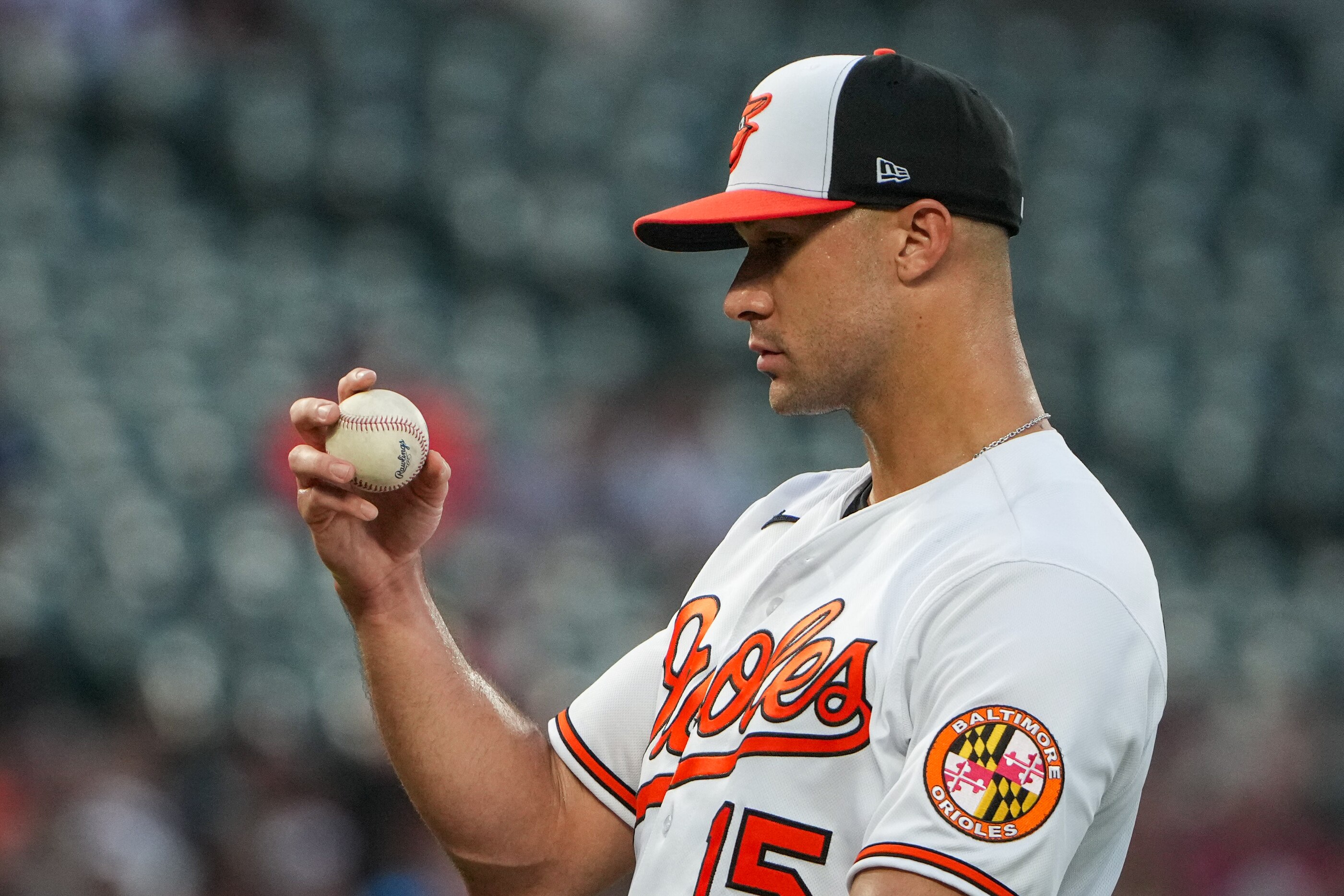 Baltimore Orioles starting pitcher Jack Flaherty (15) gets ready to pitch in the second inning of a baseball game against the Houston Astros at Orioles Park at Camden Yards in Baltimore on August 9, 2023.