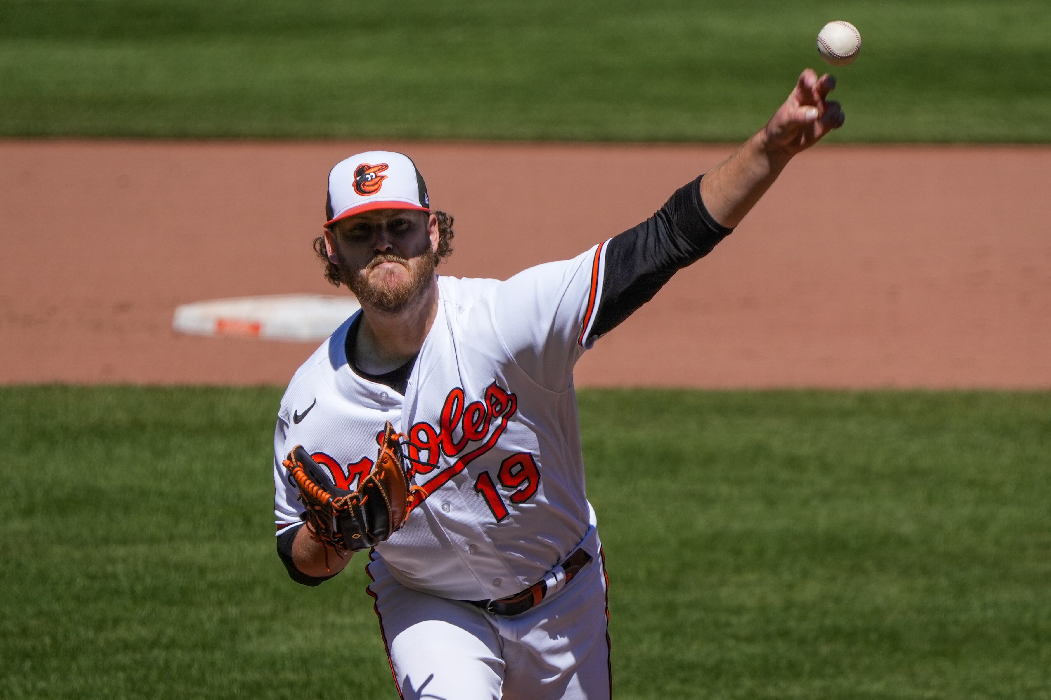 Baltimore Orioles starting pitcher Cole Irvin (19) delivers a pitch in a baseball game against the Oakland Athletics at Camden Yards on Wednesday, April 12. This was the fourth game in a series the Orioles played against the Athletics.