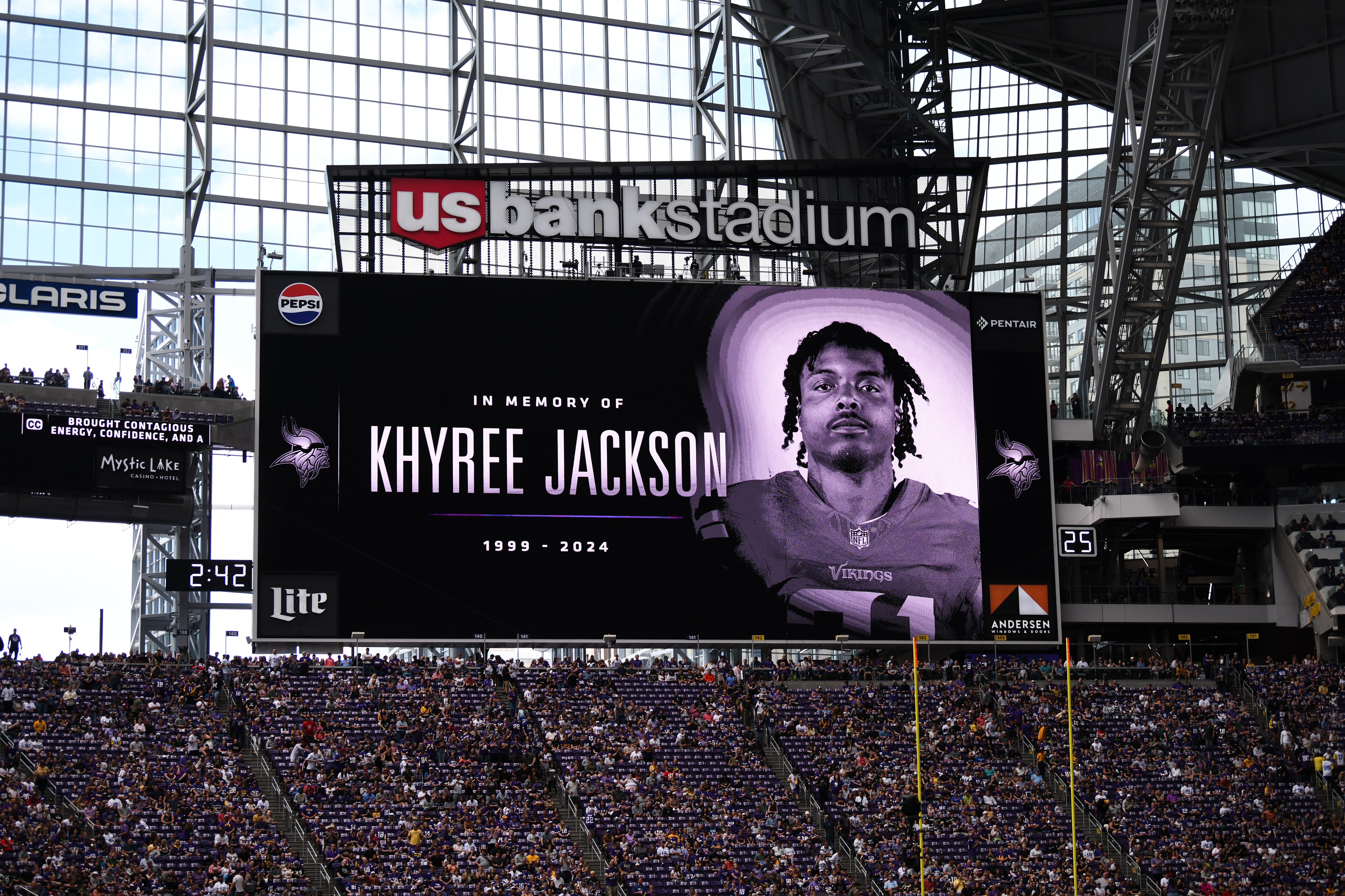 MINNEAPOLIS, MINNESOTA - AUGUST 10: A tribute to Minnesota Vikings player Khyree Jackson is shown on the screen before the preseason game between the Las Vegas Raiders and Minnesota Vikings  at U.S. Bank Stadium on August 10, 2024 in Minneapolis, Minnesota. Jackson was rookie this year and was killed in a car wreck before the season. (Photo by Stephen Maturen/Getty Images)