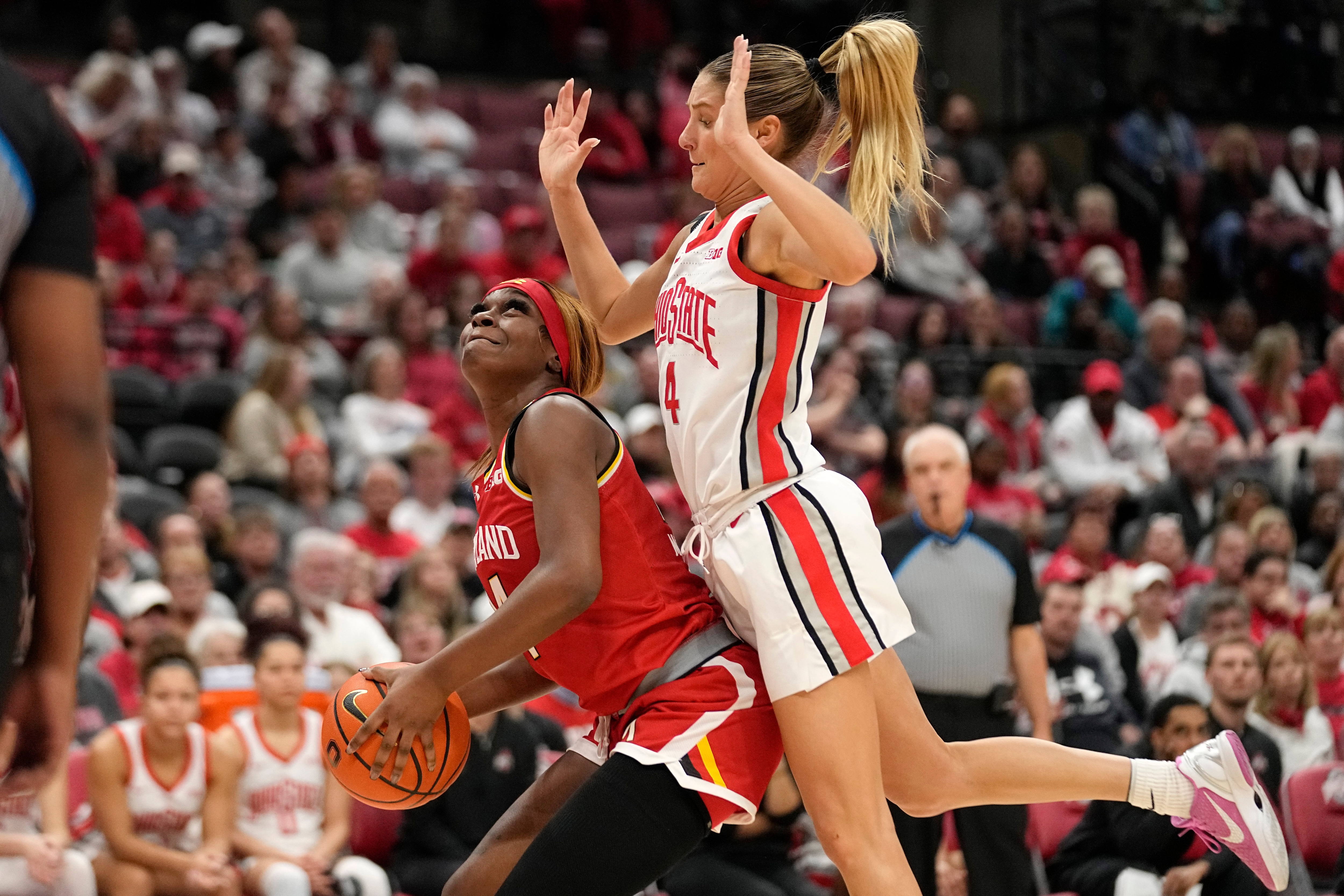 Maryland guard Bri McDaniel, left in a game last season, scored 21 points Saturday against Wisconsin.