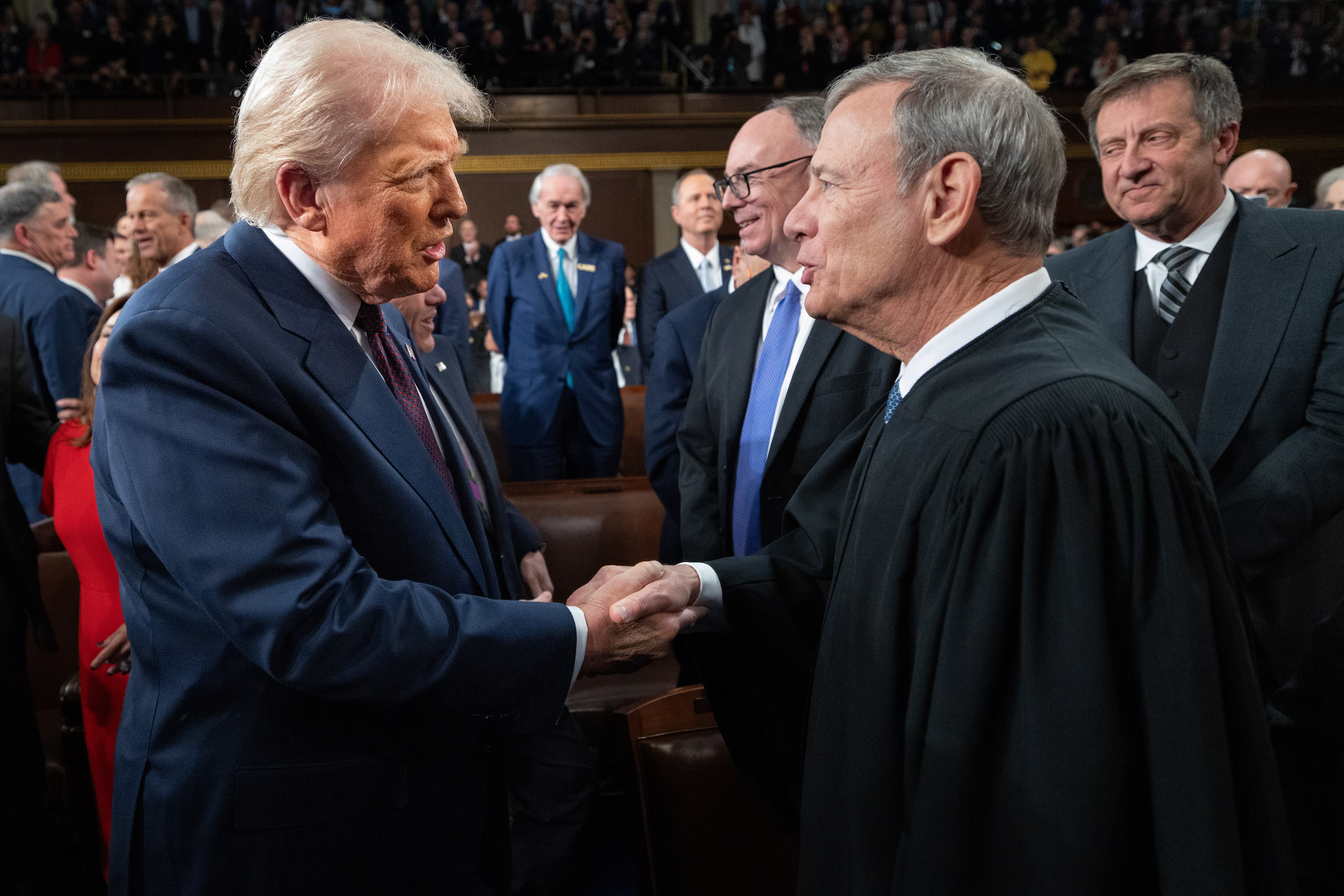 WASHINGTON, DC - MARCH 04: U.S. President Donald Trump (L) greets Chief Justice of the United States John G. Roberts, Jr as he arrives to deliver an address to a joint session of Congress at the U.S. Capitol on March 04, 2025 in Washington, DC. President Trump was expected to address Congress on his early achievements of his presidency and his upcoming legislative agenda.  (Photo by Win McNamee/Getty Images)