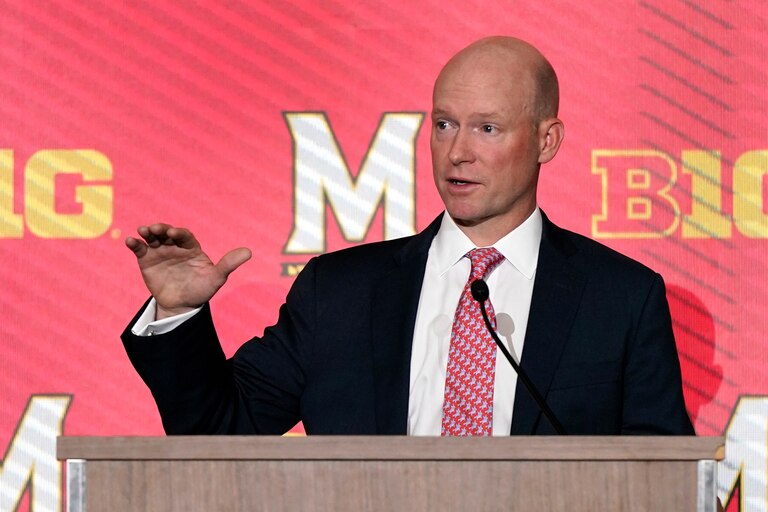This picture shows Maryland men's basketball coach Kevin Willard at a press conference.