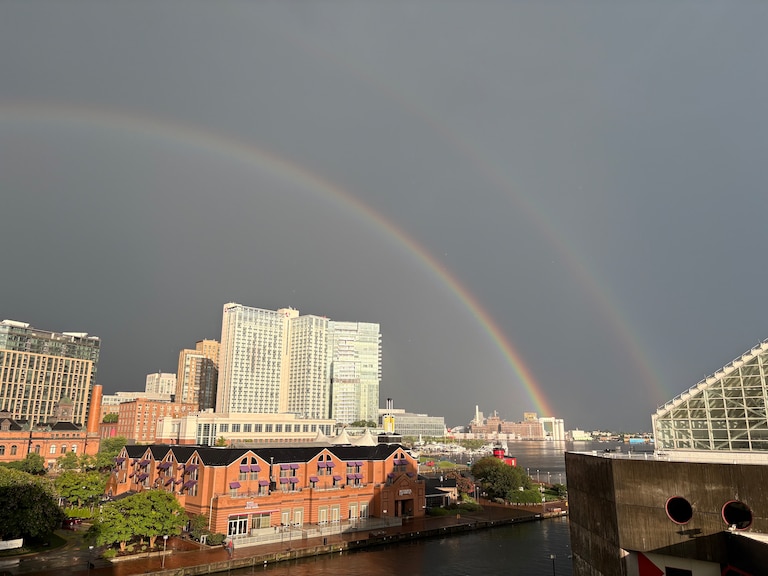 A rainbow emerged over the Inner Harbor after severe thunderstorms passed though the region on Tuesday.