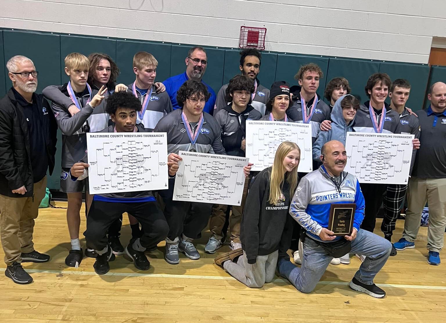 Sparrows Point displays its awards after its third consecutive team title at the Baltimore County wrestling tournament.