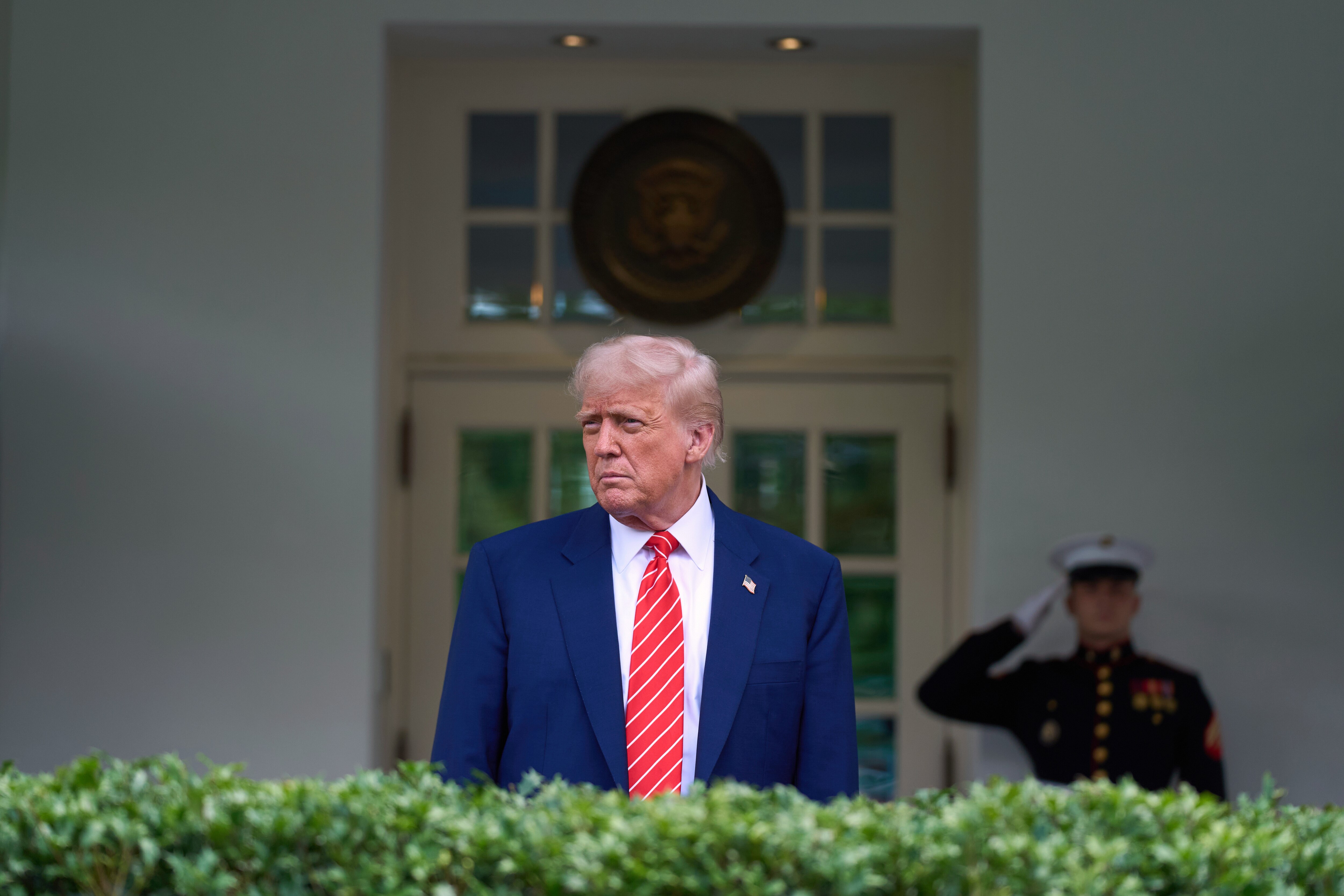 President Donald Trump speaks to reporters outside the West Wing of the White House, Thursday, May 8, 2025, in Washington.