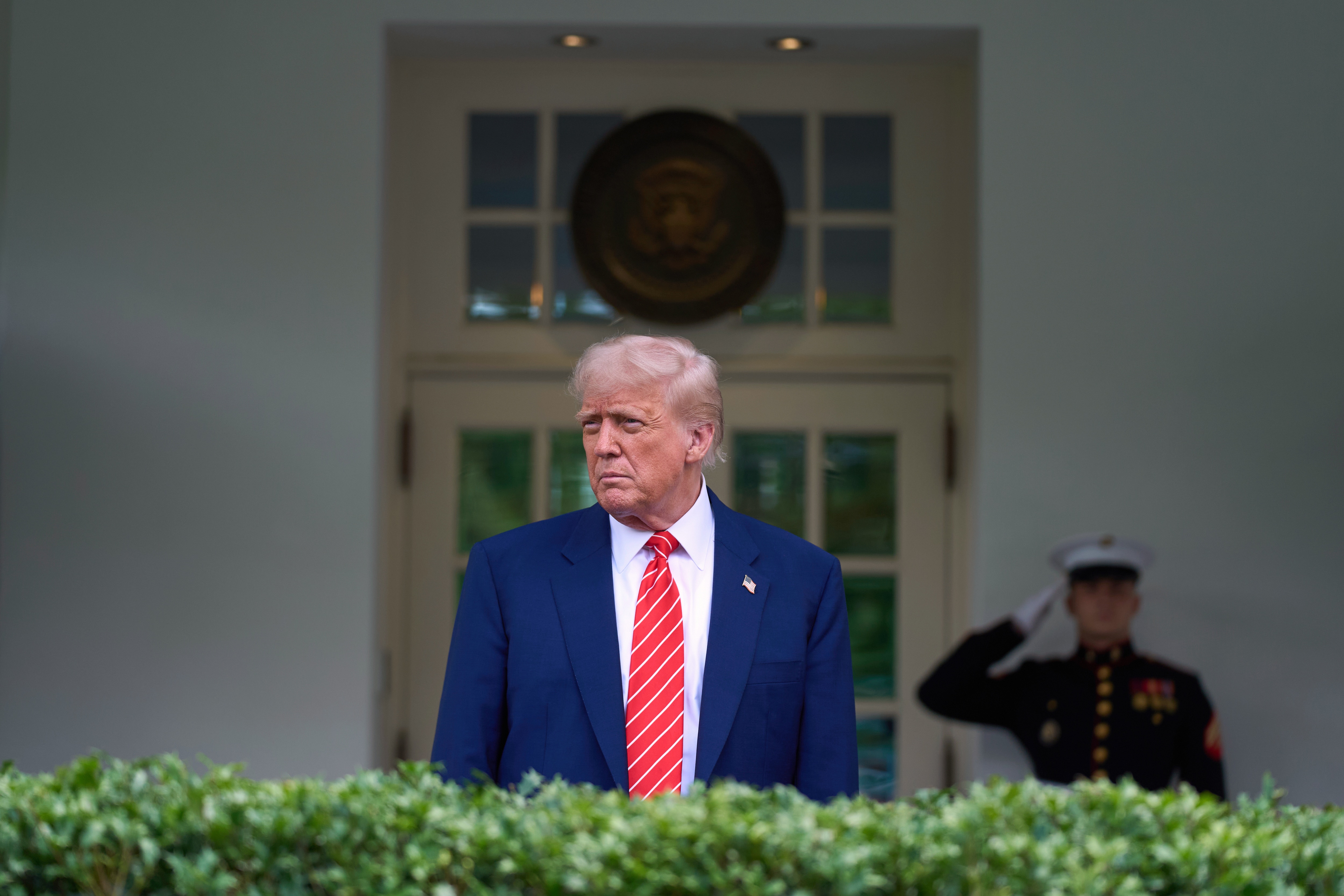 President Donald Trump speaks to reporters outside the West Wing of the White House, Thursday, May 8, 2025, in Washington.