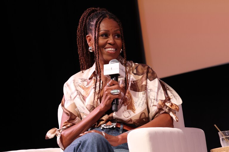 MARTHA'S VINEYARD, MASSACHUSETTS - AUGUST 09: Michelle Obama speaks during Higher Ground's "IMO with Michelle Obama & Craig Robinson" podcast during 2025 Martha's Vineyard African American Film Festival at Martha's Vineyard Performing Arts Center on August 09, 2025 in Martha's Vineyard, Massachusetts. (Photo by Arturo Holmes/Getty Images)