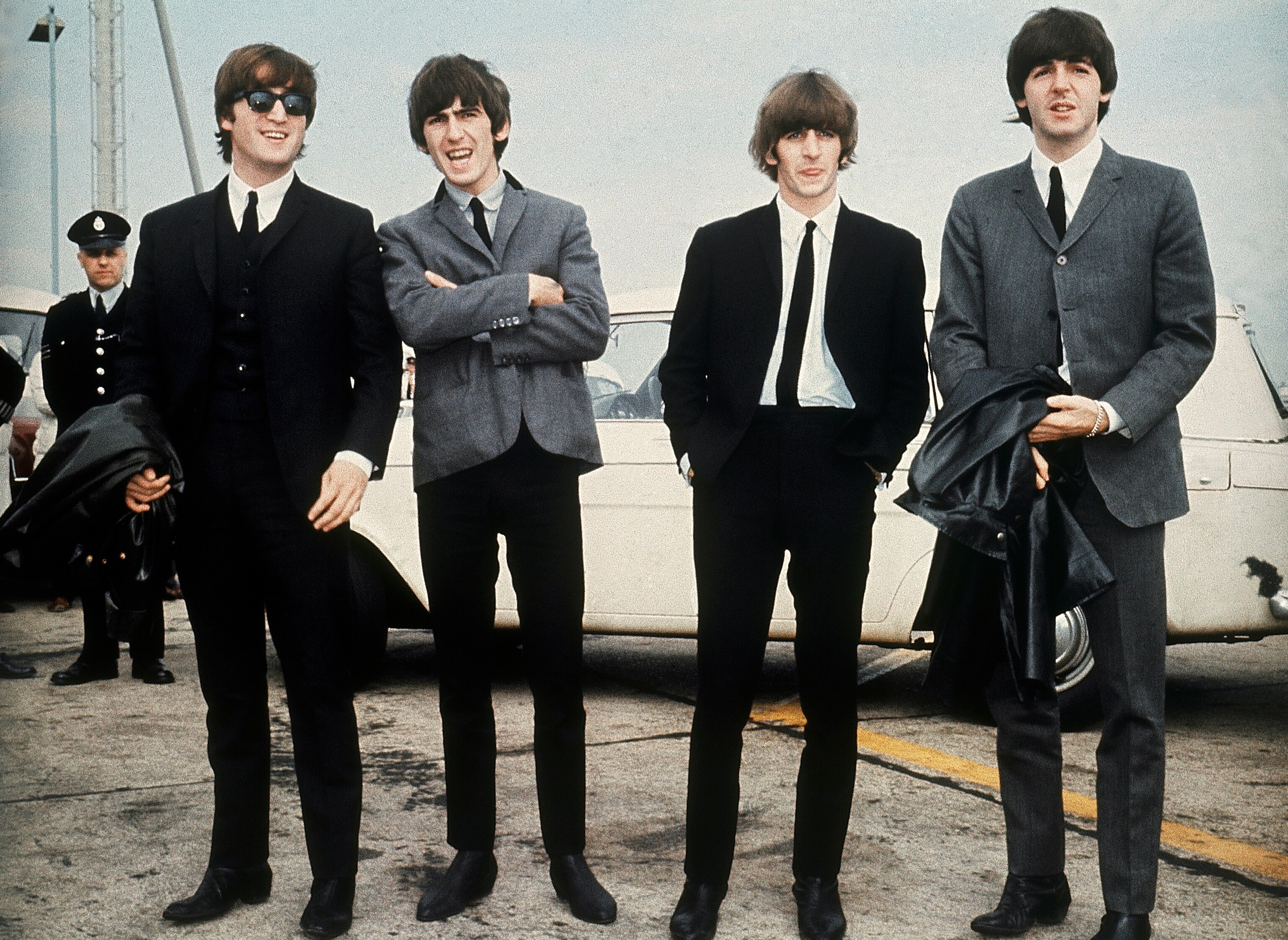 FILE - The Beatles, from left, John Lennon, George Harrison, Ringo Starr and Paul McCartney arrive in Liverpool, England on July 10, 1964, for the premiere of their movie "A Hard Day's Night." (AP Photo, File)