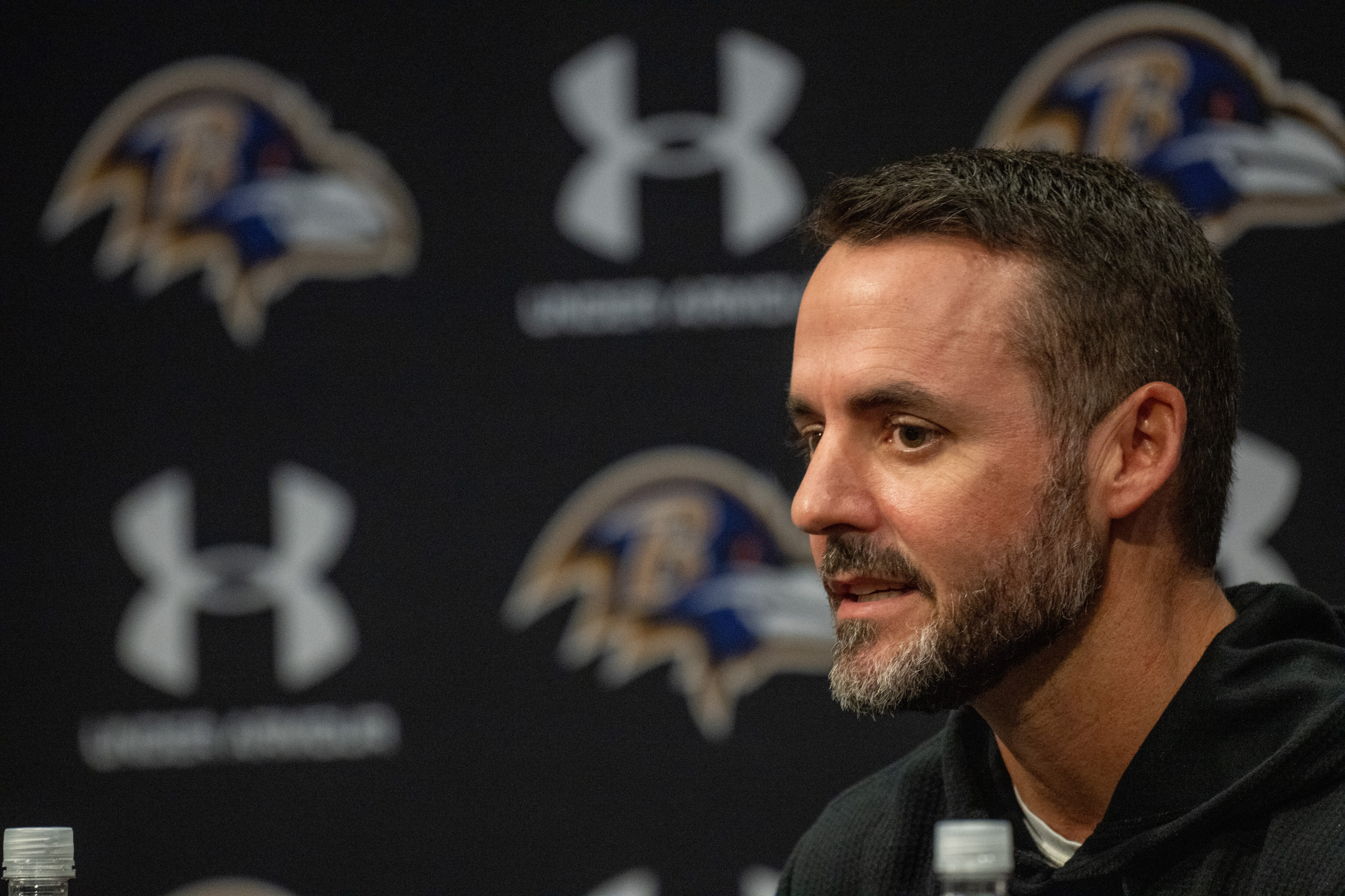 Ravens head coach Jesse Minter speaks during the press conference introducing outside linebacker Trey Hendrickson on March 13.