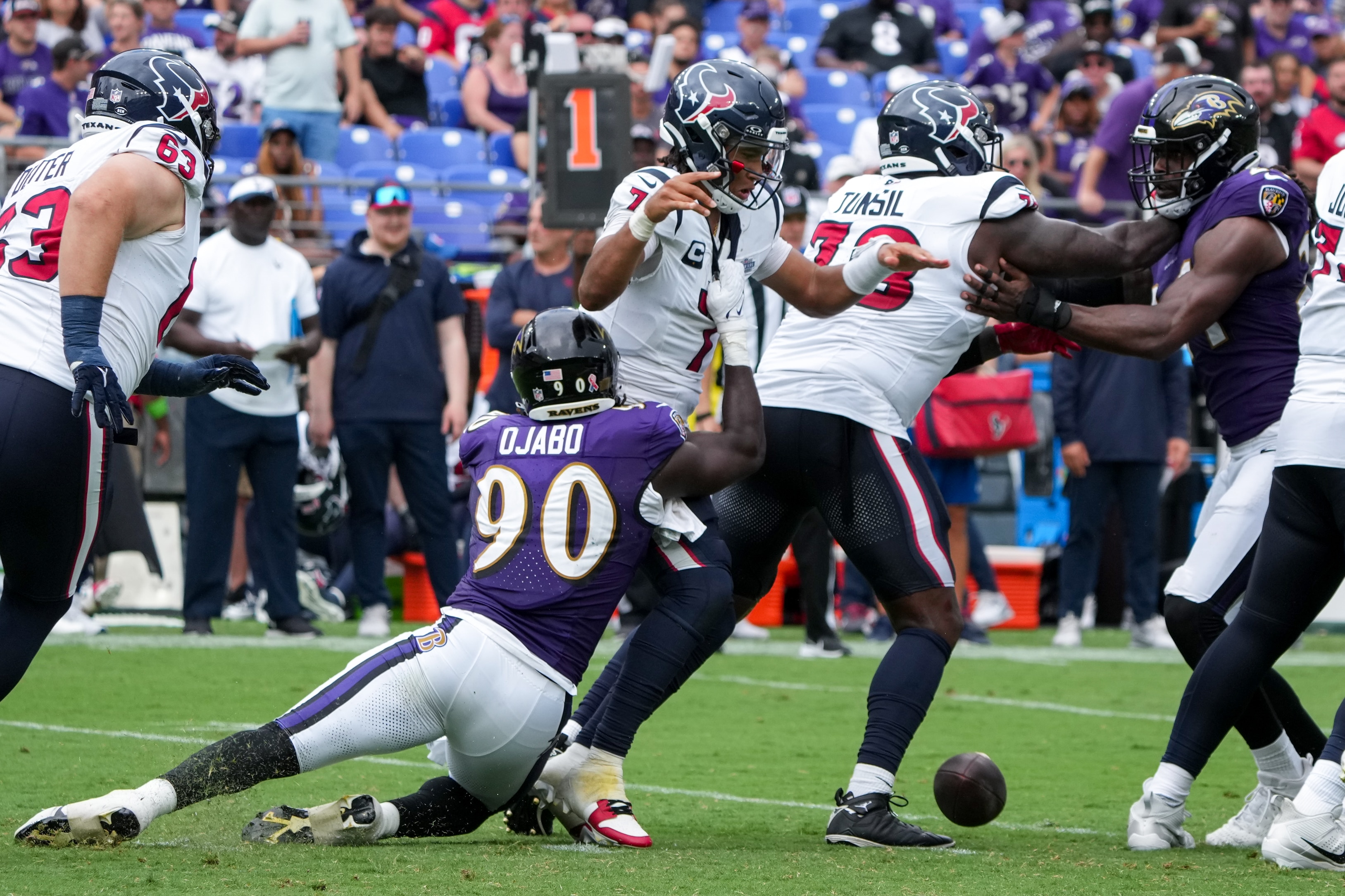 Ravens linebacker David Ojabo forces Houston Texans quarterback C.J. Stroud to fumble in Week 1.
