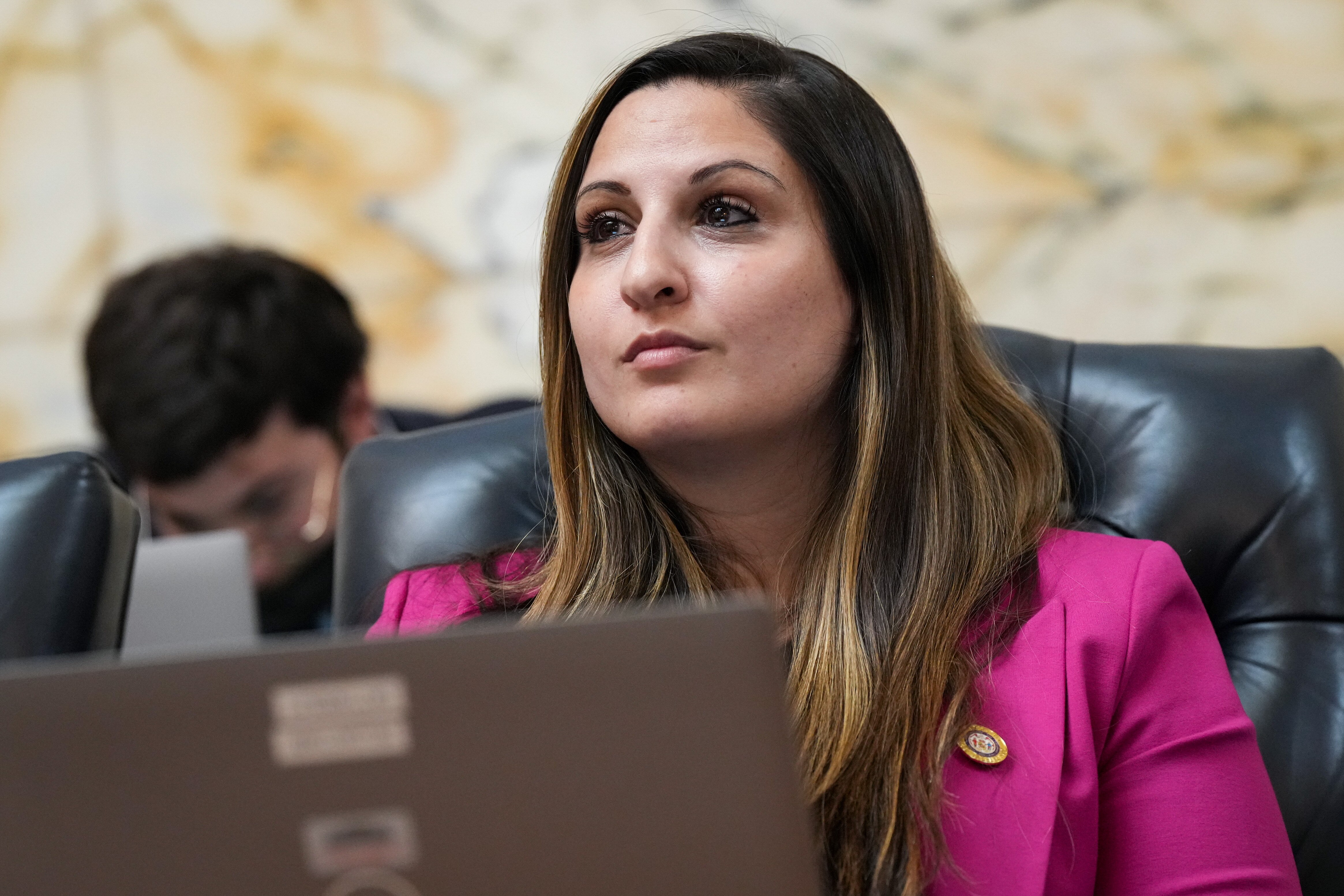 Del. Dalya Attar, a Baltimore City Democrat, listens to floor debate at the Maryland State House on Monday, March 20, also known as Crossover Day in Annapolis. General Assembly session rules require bills to pass one chamber — either the House of Delegates or the state Senate — by the end of the day on Monday, to ensure the other chamber will consider it.