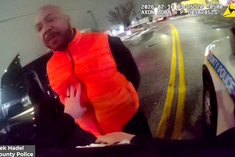 The Maryland Attorney General’s Office released body camera footage showing Samuel “Big Sam” Brown Jr.’s swatting away Baltimore County Police Officer Derek Hadel’s arm twice before he punches Brown twice — knocking him into the asphalt.