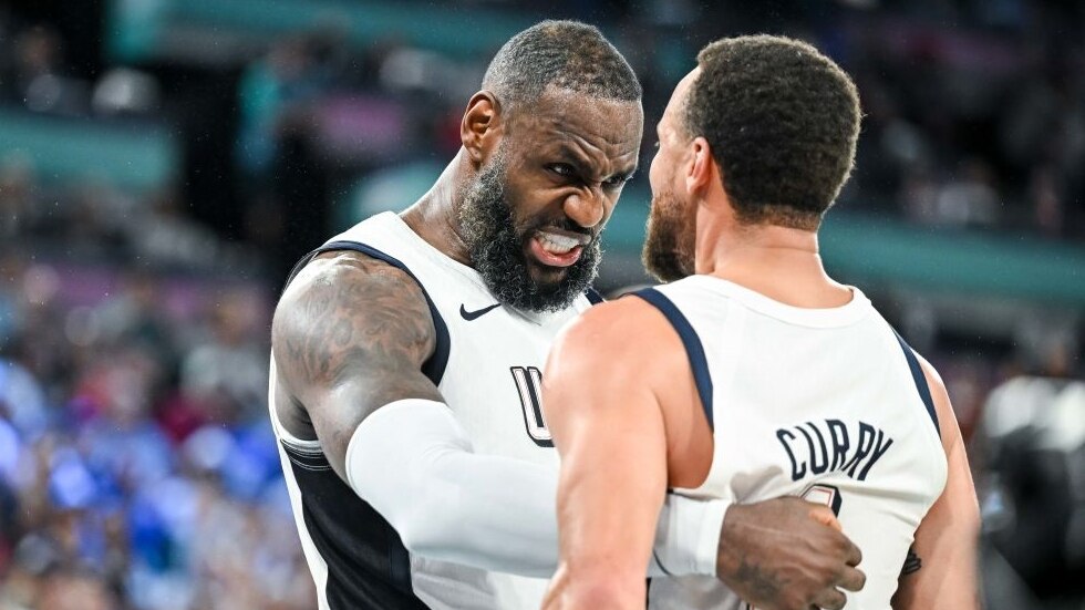 LeBron James of USA and Stephen Curry of USA cheer after the victory during the Men's Basketball semi-final match between USA and Serbia on Day 13 of the Olympic Games Paris 2024 at Bercy Arena on August 8, 2024 in Paris, France. (Photo by Harry Langer/DeFodi Images via Getty Images)