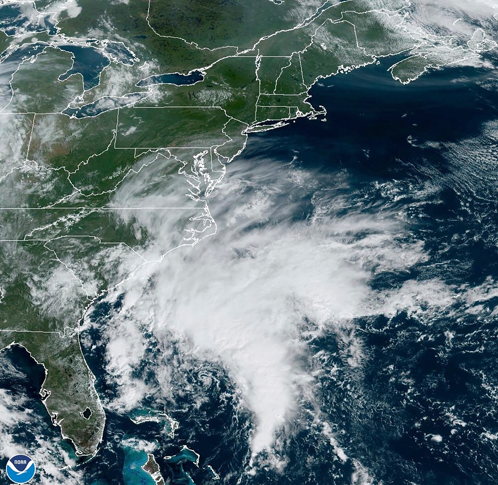This Thursday, Sept. 21, 2023, satellite image provided by the National Oceanic and Atmospheric Administration shows a potential tropical cyclone forming off the southeastern coast of the United States in the Atlantic Ocean. (NOAA via AP)