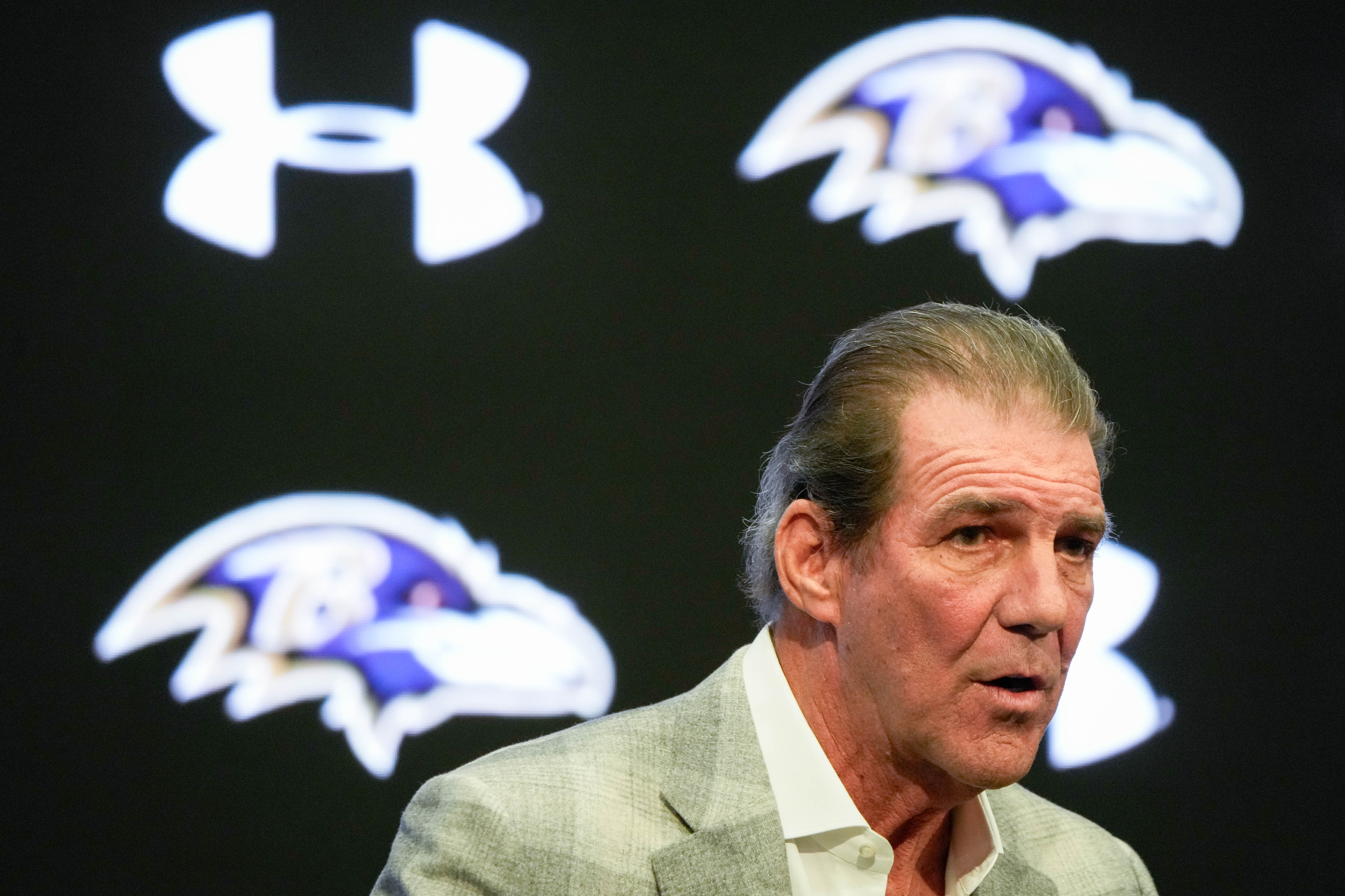 Ravens owner Steve Bisciotti takes questions from reporters during the team’s end-of-season news conference Monday.
