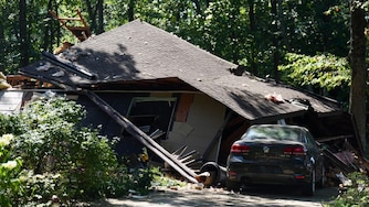 WEDNESDAY, AUGUST 19, 2026 - After a fatal home explosion outside of Annapolis, emergency rescue officials block access to the home as they assess the damage.