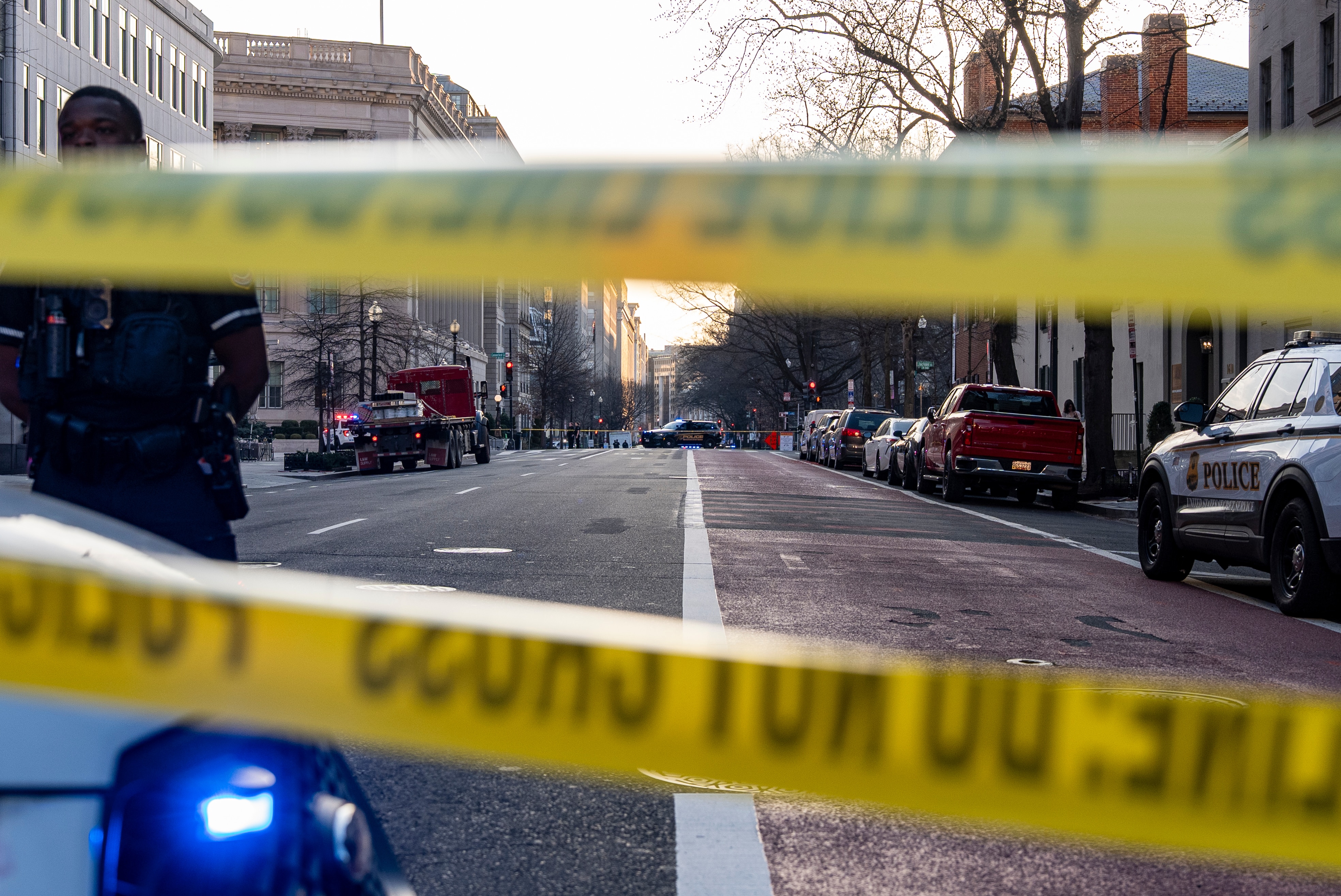 Washington Metropolitan Police Department officers block the streets around the White House.
