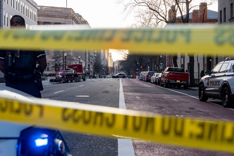 Washington Metropolitan Police Department officers block the streets around the White House.