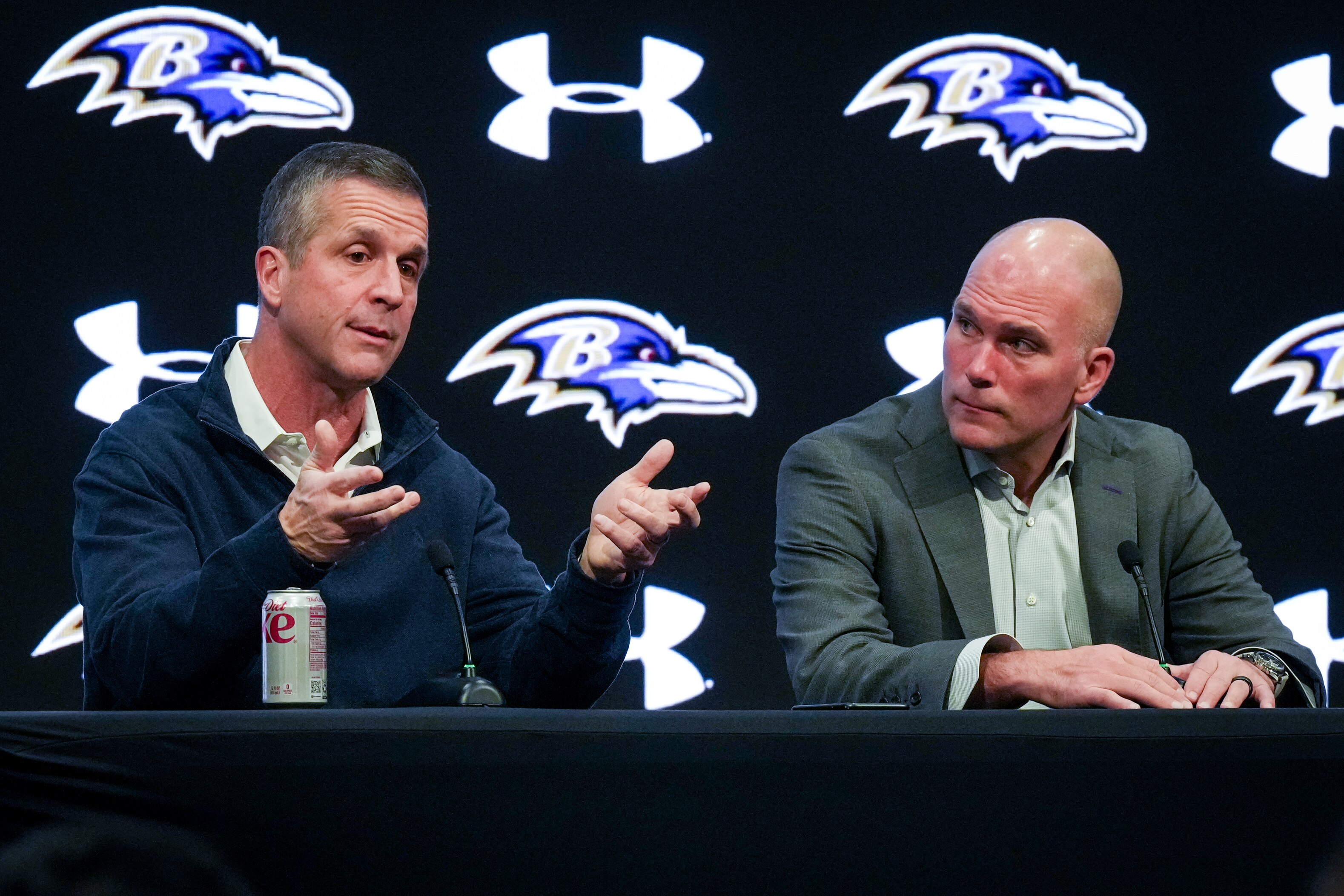 Ravens general manager Eric DeCosta (right, with coach John Harbaugh at a news conference Friday), prefers to build through the draft.