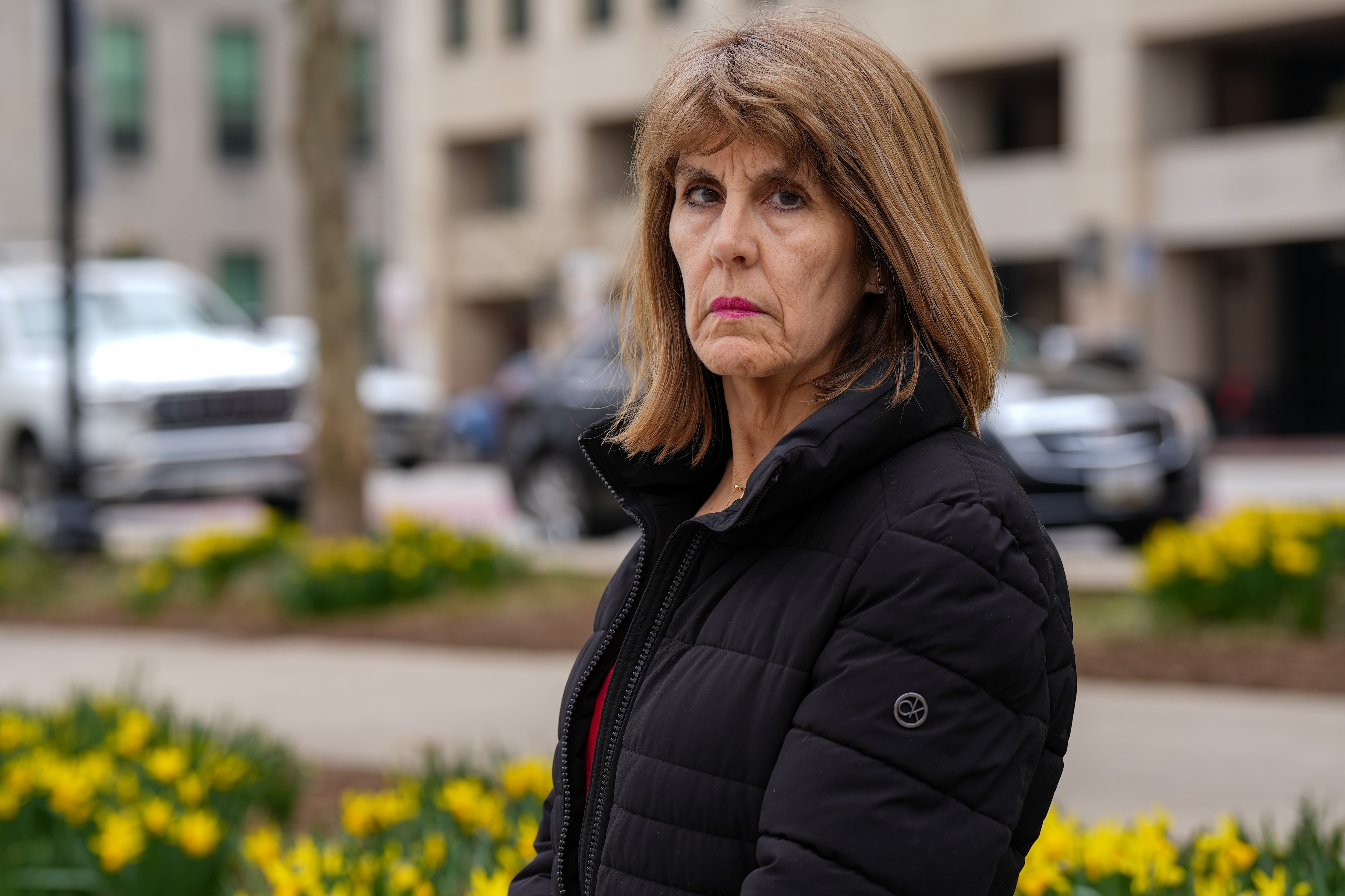 Isabel Mercedes Cumming, Baltimore City's Inspector General, sits for a portrait in War Memorial Plaza on Monday, March 13.