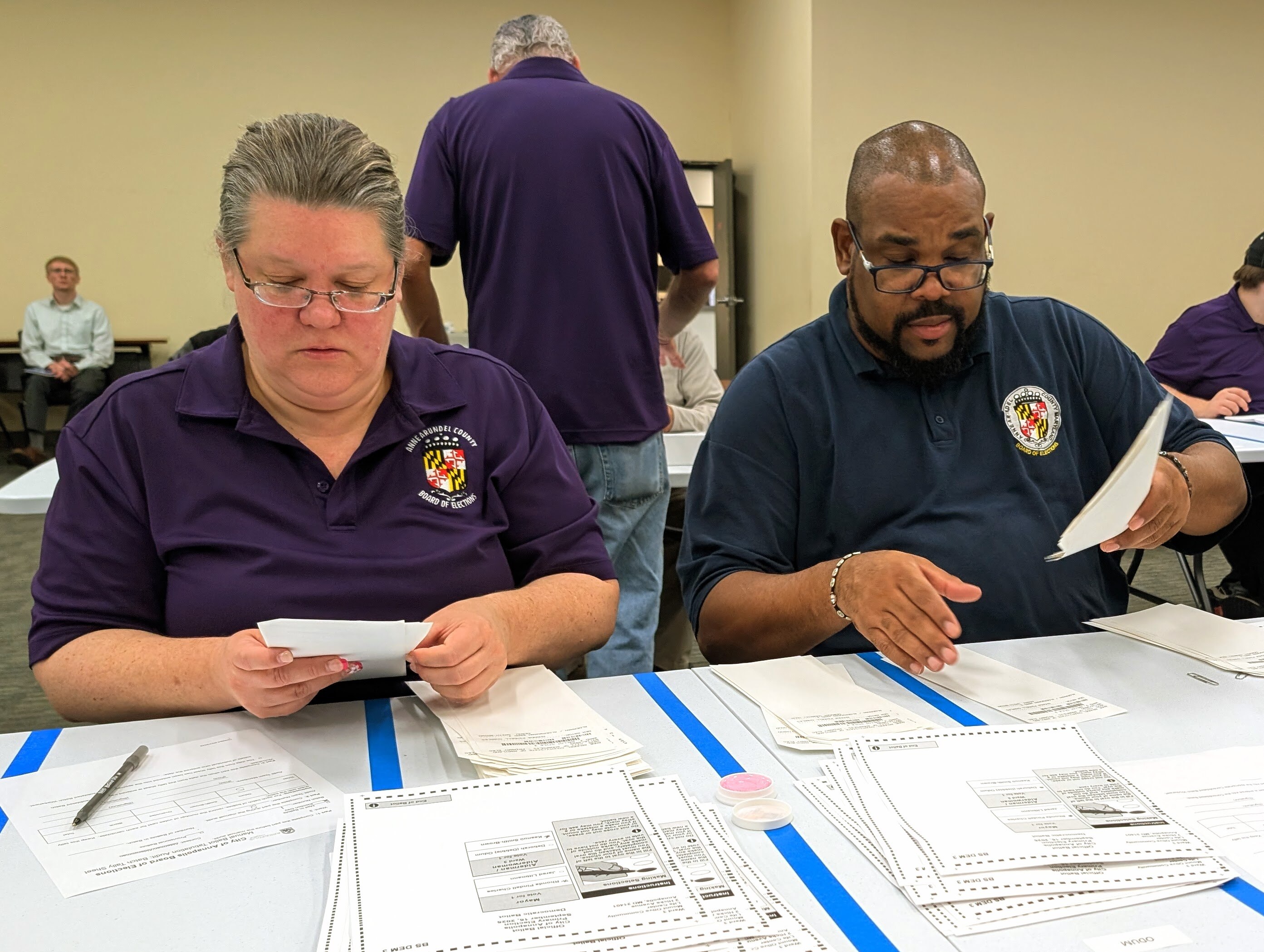 Employees at the Anne Arundel County Board of Elections office in Glen Burnie hand-count ballots on Sept. 25, 2025 in the Annapolis primary.