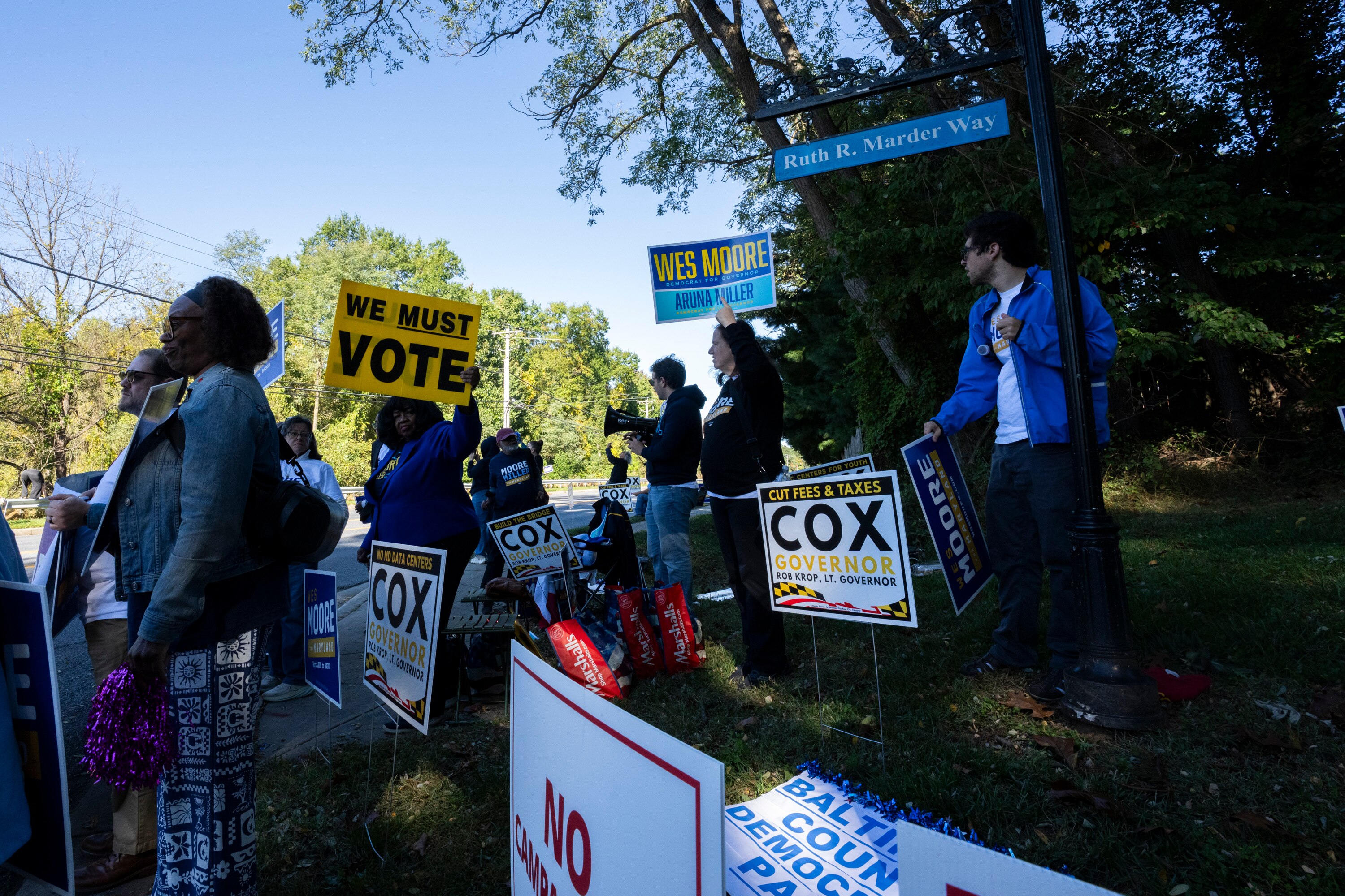 Supporters of both governor candidates outside the studios at Maryland Public Television Tuesday. Democratic Gov. Wes Moore and Republican nominee Dan Cox recorded a debate that airs Tuesday evening.