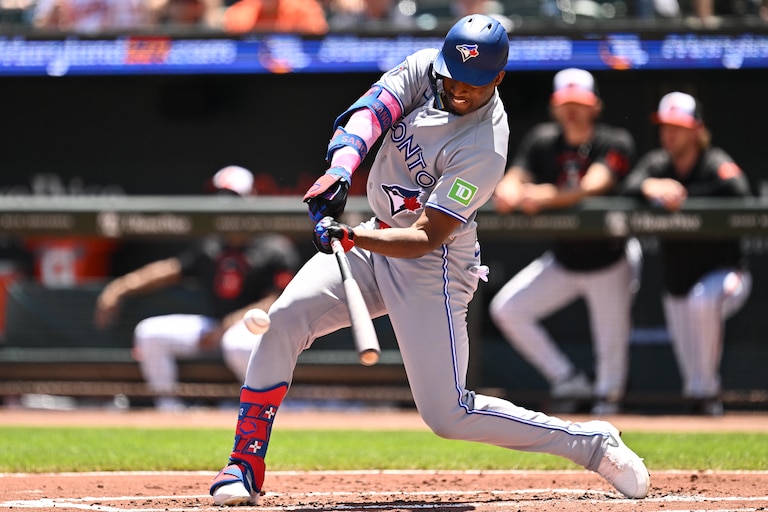 BALTIMORE, MD - MAY 31: Jesús Sánchez #12 of the Toronto Blue Jays hits a single in the second inning against the Baltimore Orioles at Oriole Park at Camden Yards on May 31, 2026 in Baltimore, Maryland.