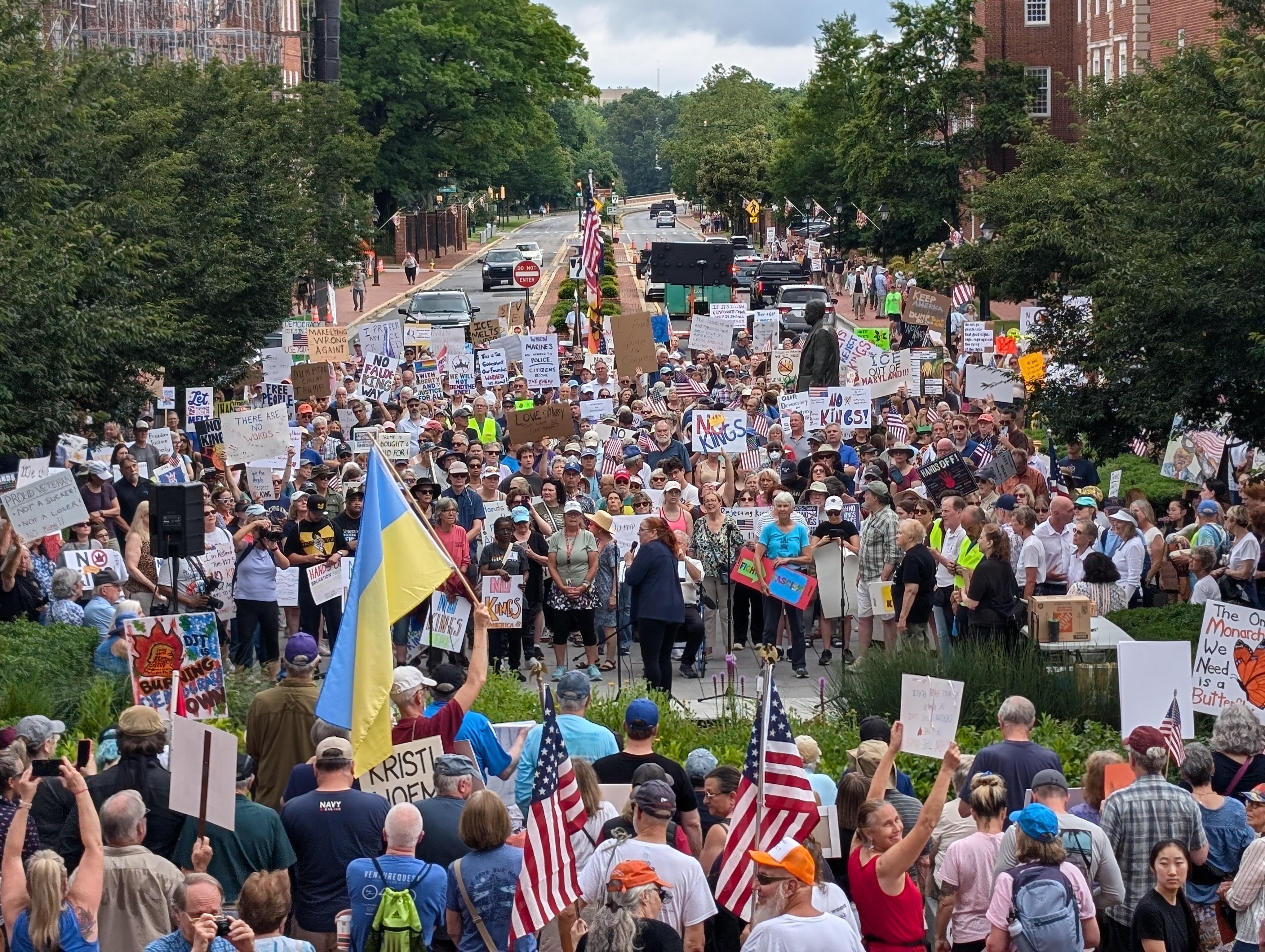 Del. Heather Bagnall warms up the crowd on June 14, 2025 as it begins to fill in Lawyer's Mall at the State House in Annapolis. The crowd eventually overflowed onto the surrounding sidewalks and even across the street.