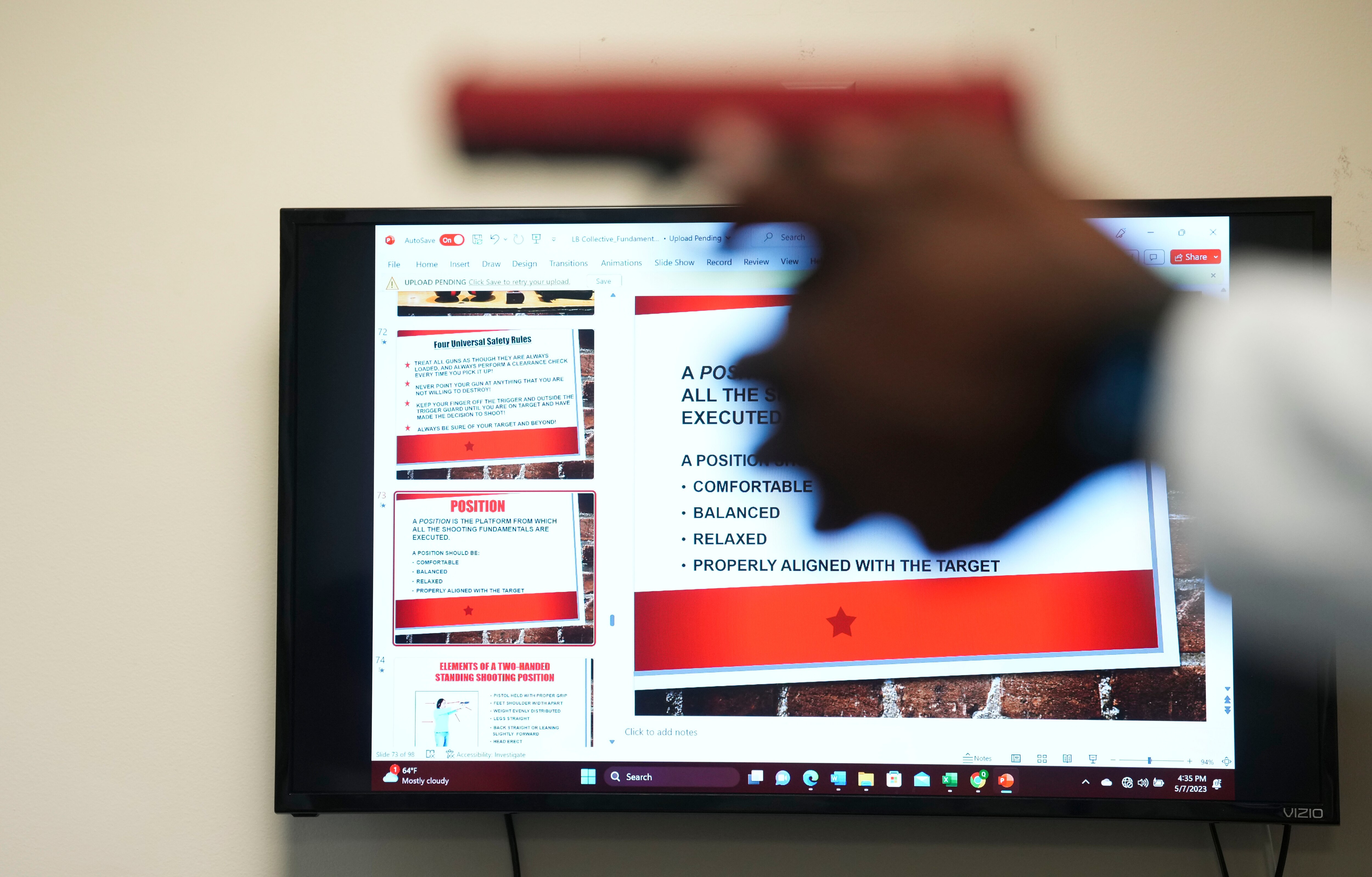 Quiana Roberts, a federal law enforcement agent and firearms instuctor, teaches students how to be safe and responsible gun owners during a class on May 8, 2023.