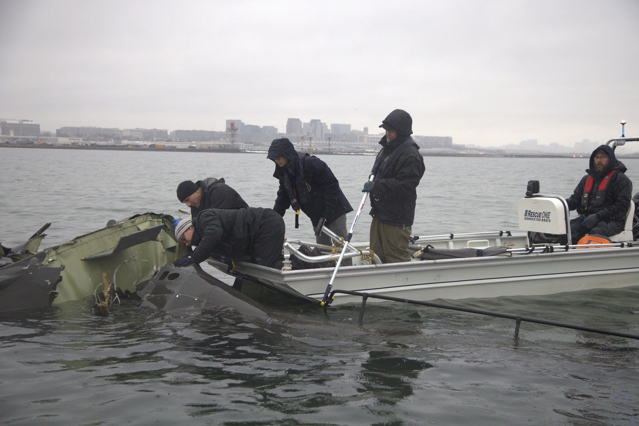 A National Transportation Safety Board crew investigates the deadly midair collision above the Potomac River between a Black Hawk helicopter and a jet airliner.
