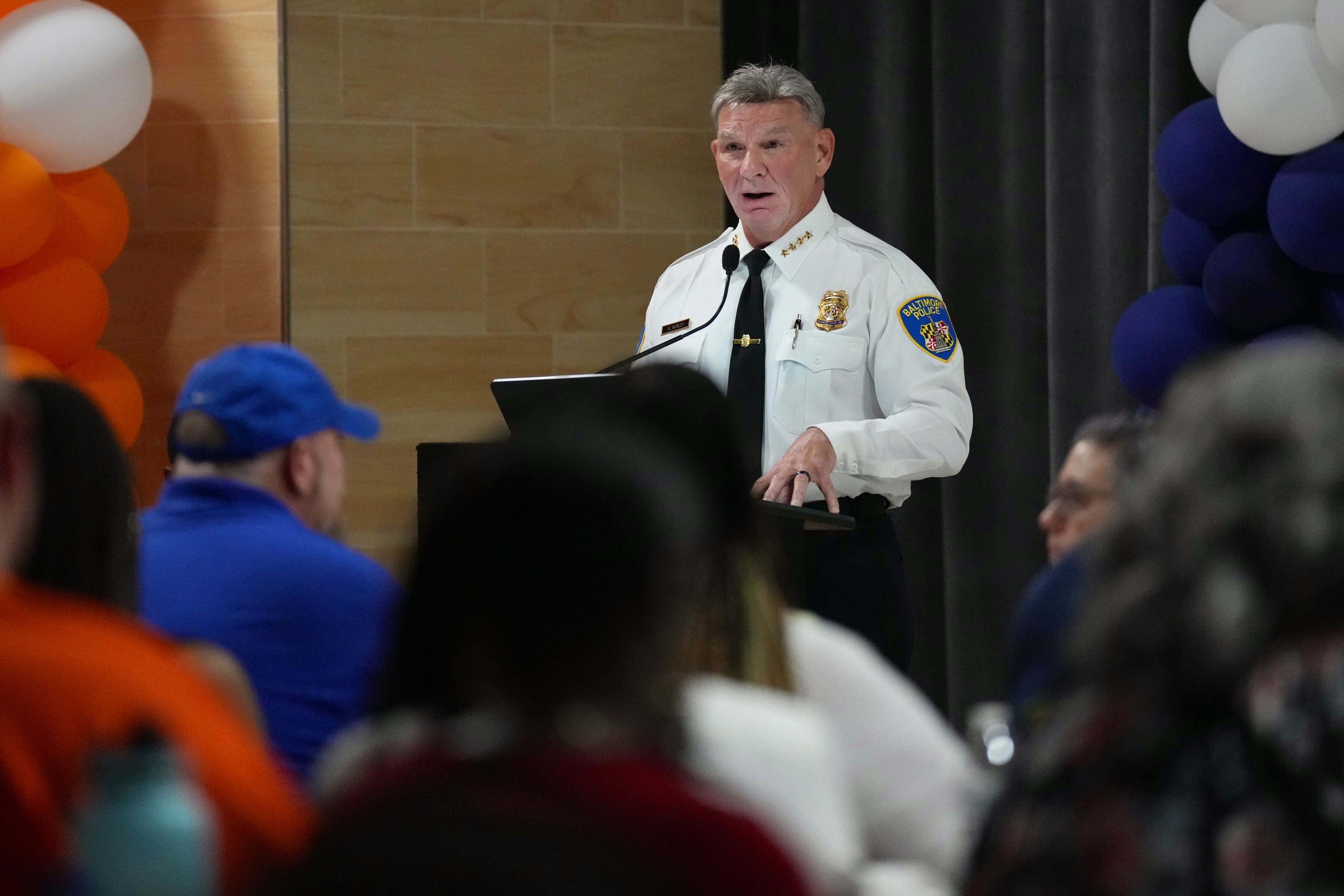 Acting Baltimore Police Commissioner Richard Worley speaks at a Brooklyn community meeting Thursday night at Bay-Brook Elementary/Middle School.