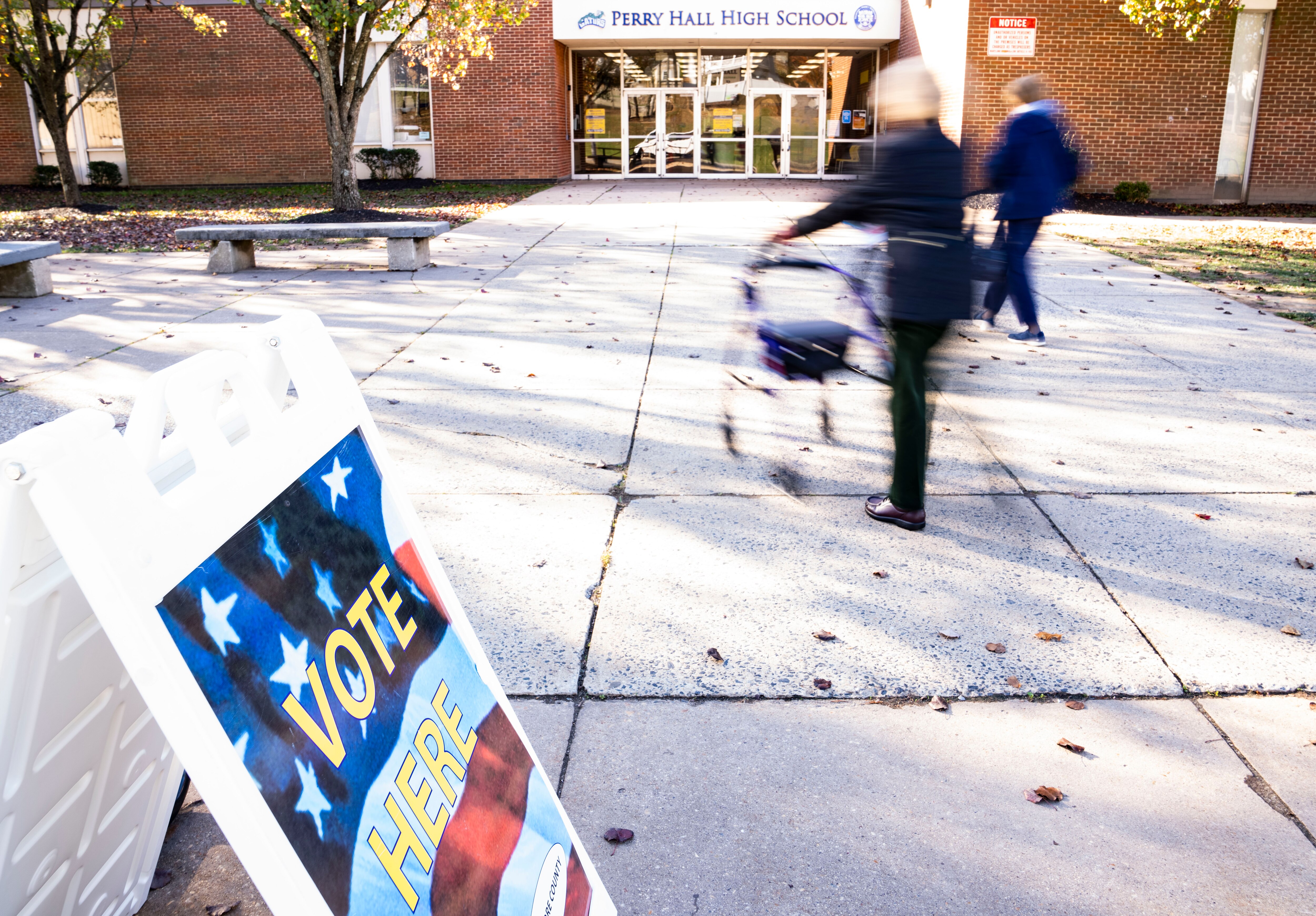 Voters walk into Perry Hall High School to cast their vote, in Nottingham, Tuesday, November 8, 2022.