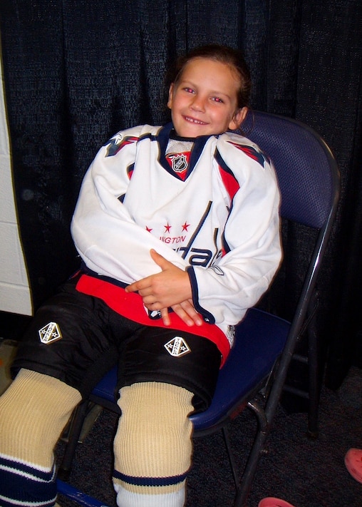 Lacey Eden, a member of the Little Washington Capitals youth hockey program, sits in uniform during her early playing days. Eden became the first Maryland-born player selected in the PWHL Draft when she was chosen in 2026.