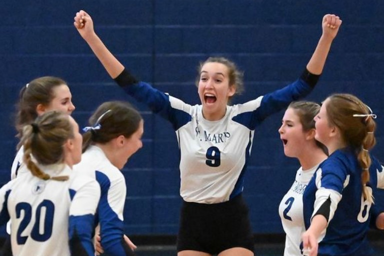 St. Mary's volleyball celebrates its opening round victory over St. Vincent Pallotti Thursday in the IAAM B Conference playoffs. The third-seeded Saints will play No. 2 seed Garrison Forest in next week's semifinals.