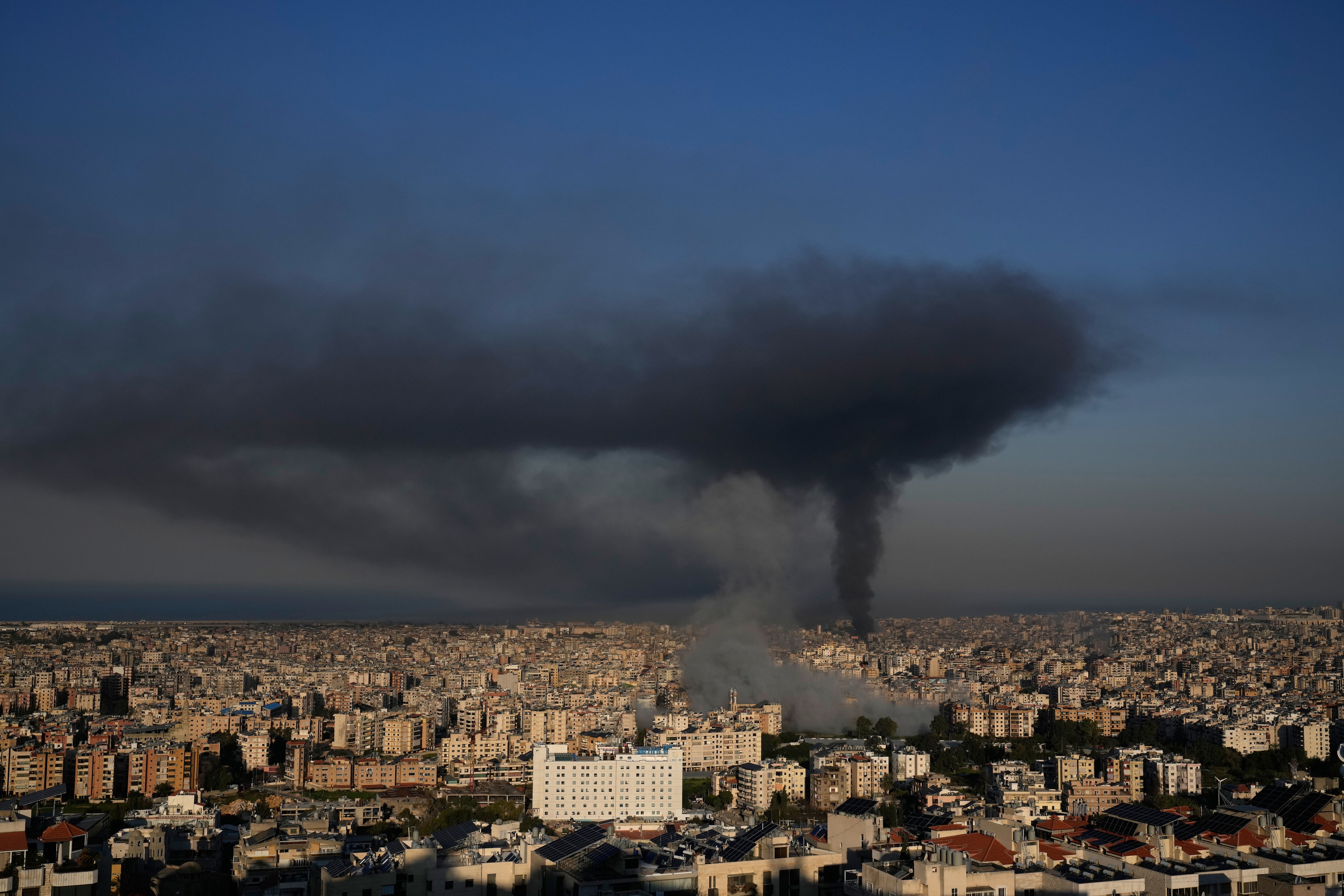 Smoke rises from Israeli airstrikes in Dahiyeh, a southern suburb of Beirut.