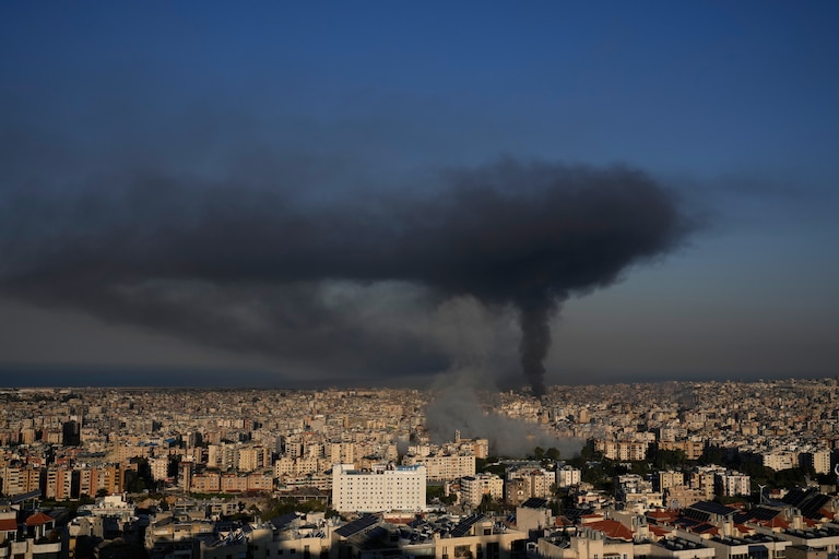 Smoke rises from Israeli airstrikes in Dahiyeh, a southern suburb of Beirut.