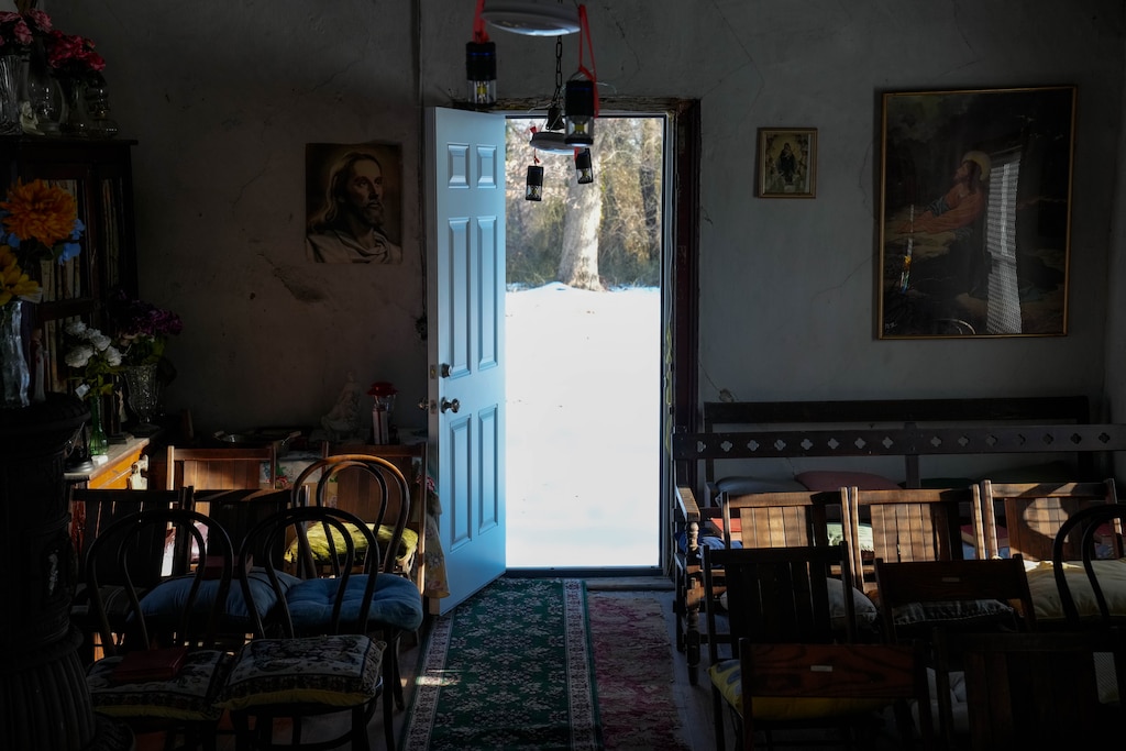 The interior, filled with religious iconography, of Dowden Chapel in Overlea, Md., on Friday, February 13, 2026. The chapel is a Black Methodist church and cemetery in the Fullerton/Overlea region that was once a hiding place on the Underground Railroad.