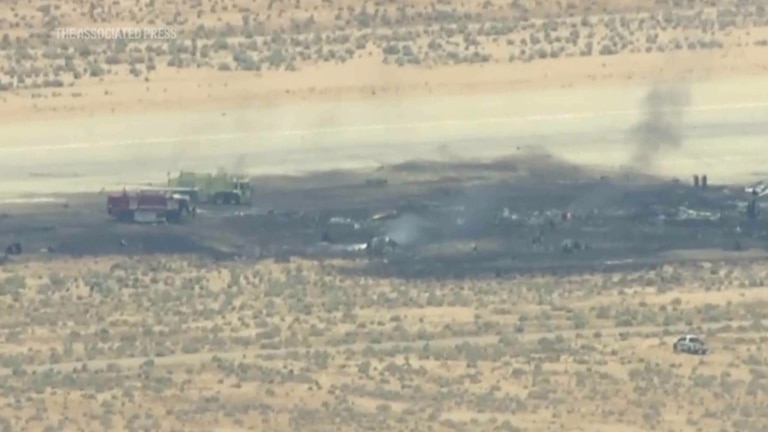 This image taken from video provided by KABC shows law enforcement responding to the scene of an aircraft crash, Monday, June 15, 2026, near Edwards Air Force Base, Calif.