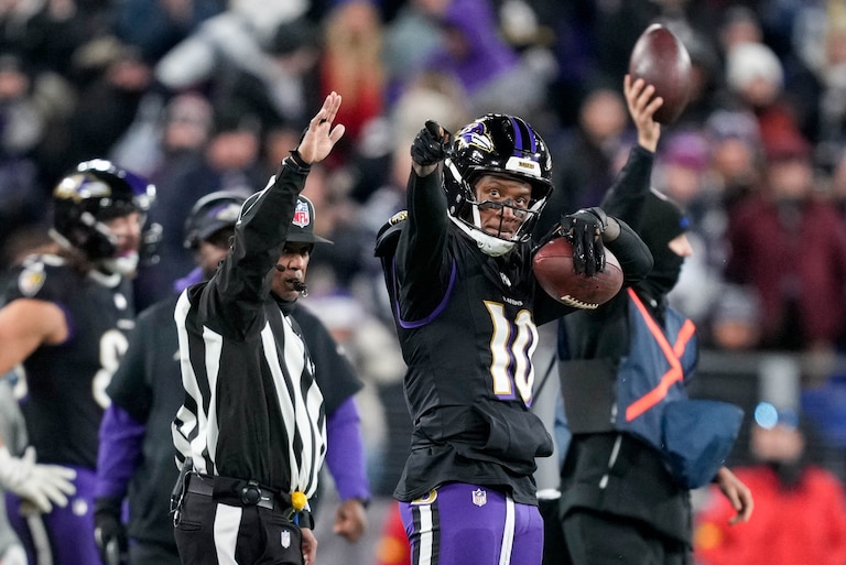 Baltimore Ravens wide receiver Deandre Hopkins (10) points downfield after catching a pass for a first down in the fourth quarter of a football game against the New England Patriots at M&T Bank Stadium in Baltimore, Md. on Sunday, December 21, 2025. The Sunday Night Football game was the Ravens’ final home game of the regular season.