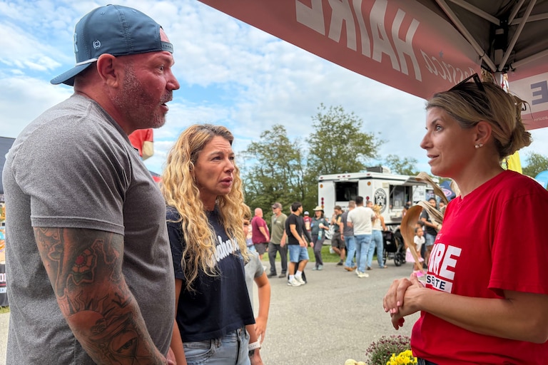 Sean and Erica Shannon of Mayo talk with state Senate candidate Jessica Haire at the Anne Arundel County Fair on Saturday, Sept. 19, 2026. “At the end of the day we need to be 50-50 Democrats and Republicans, and we’re losing Republicans," Sean said. Haire, a Republican, is trying to unseat Democratic Sen. Shaneka Henson in District 30.