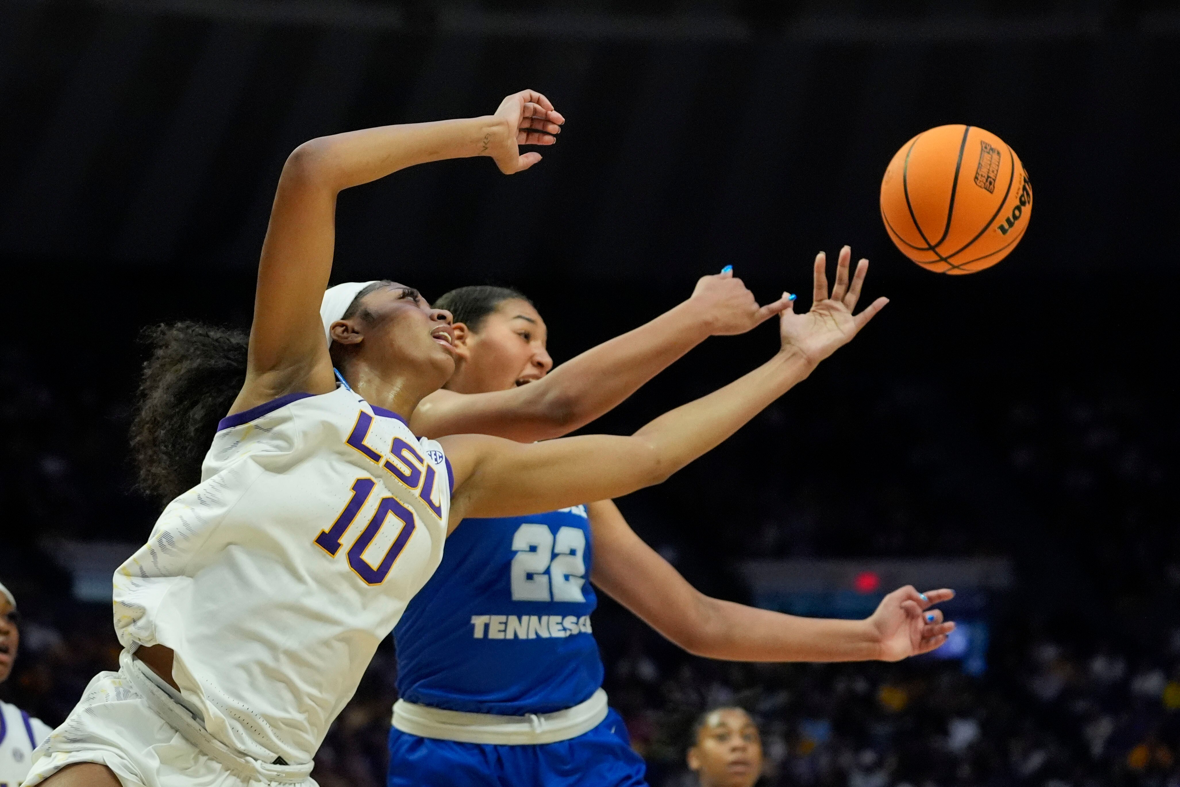 LSU forward Angel Reese battles for a rebound with Middle Tennessee forward Jada Grannum during the first half Sunday.