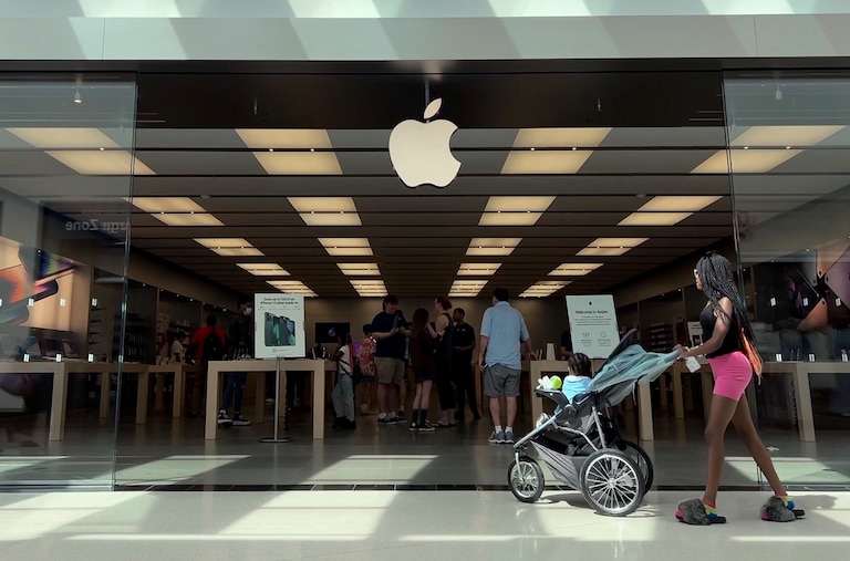 TOWSON, MARYLAND - JUNE 20: Customers shop at The Apple Store at the Towson Town Center mall, the first of the company's retail locations in the U.S. where workers voted over the weekend to unionize, on June 20, 2022 in Towson, Maryland. Following a late-pandemic era wave of workers demanding higher pay, better benefits and more negotiating leverage, 65 of the 98 workers at the Towson Apple Store voted to join the International Association of Machinists and Aerospace Workers union on June 18.