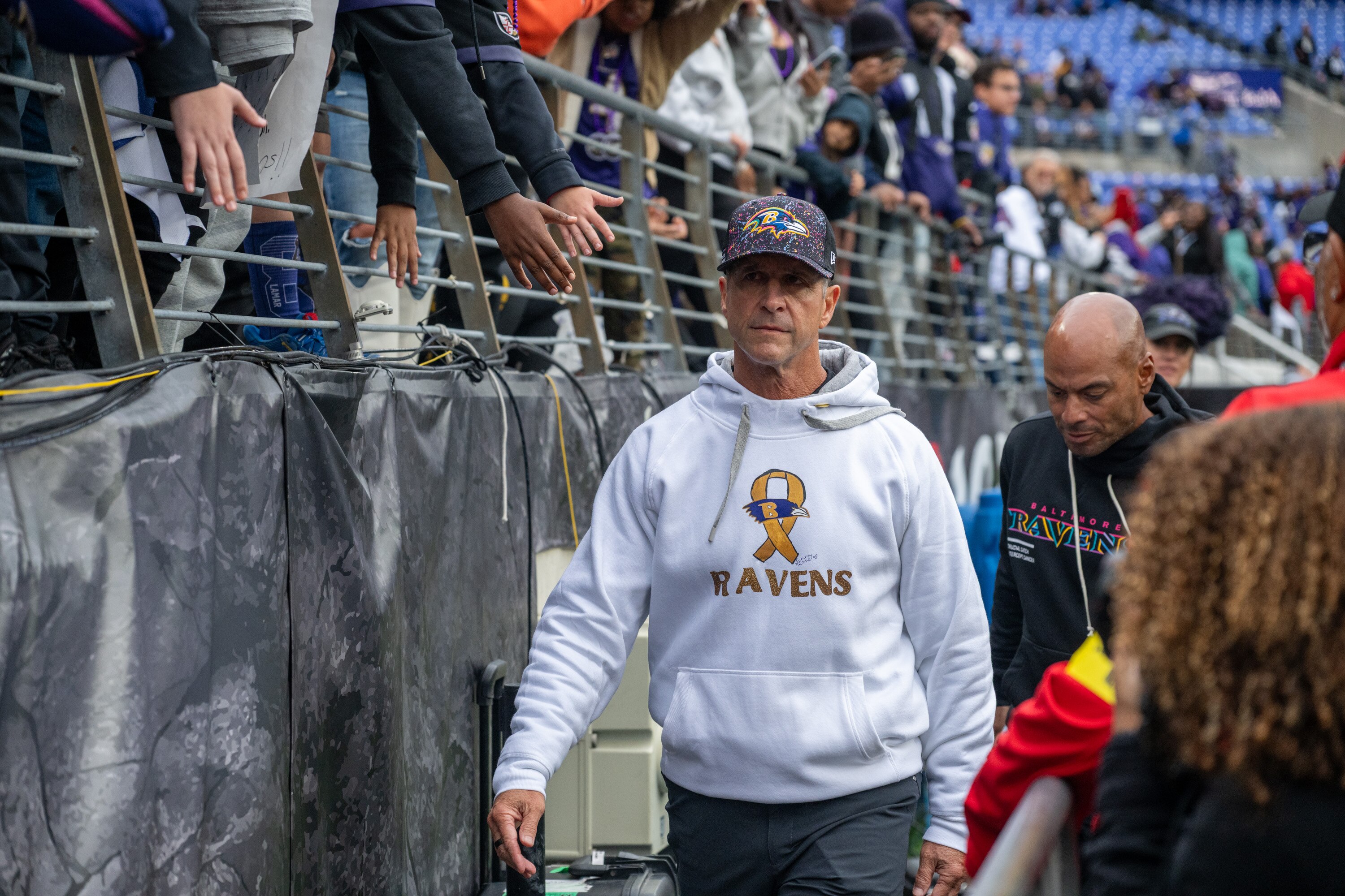Sunday, Oct. 12, 2025 — Baltimore Ravens head coach John Harbaugh walks off the field after the Ravens lost 17-3 to the Los Angeles Rams at M&T Bank Stadium.