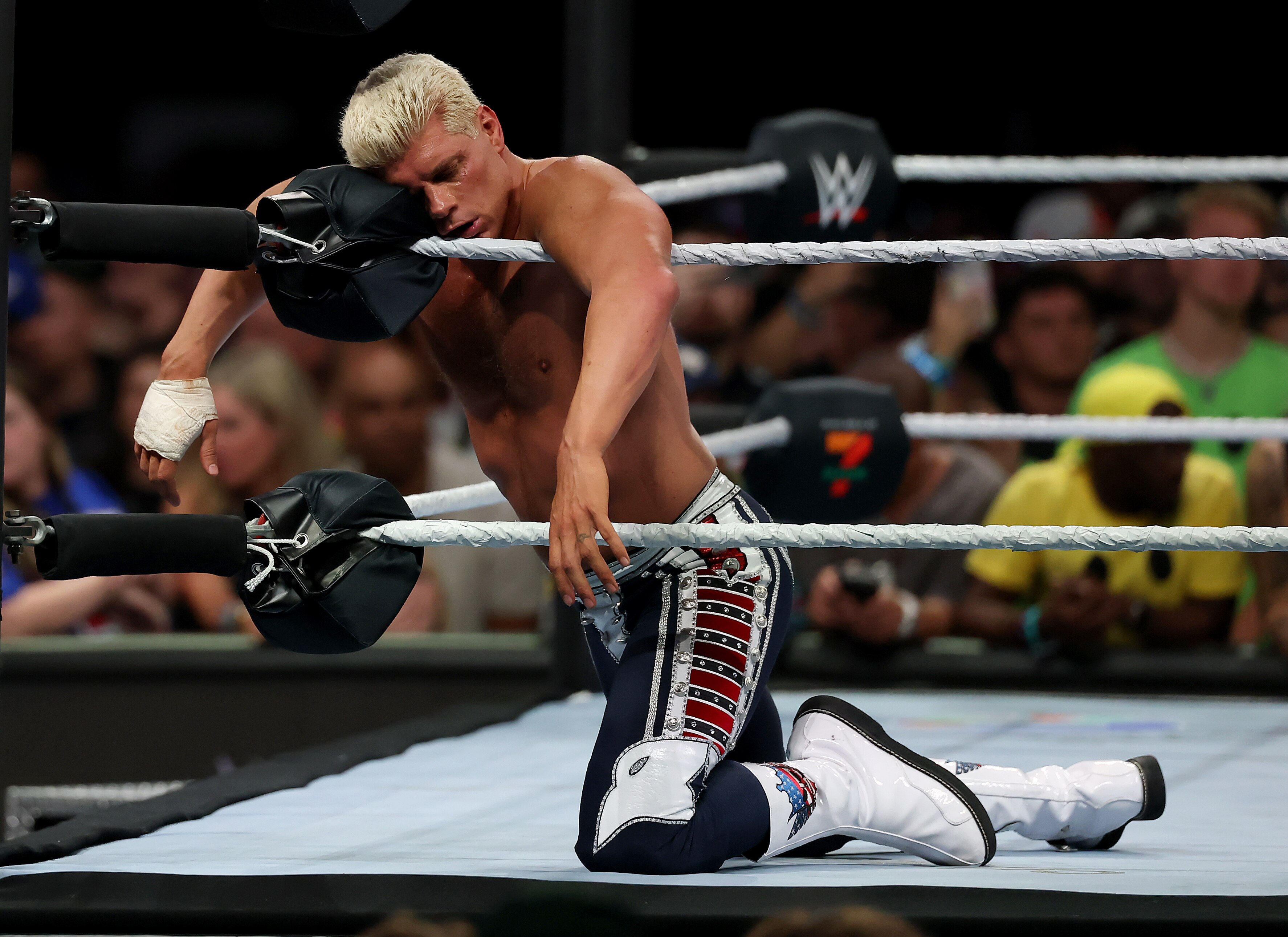 EAST RUTHERFORD, NEW JERSEY - AUGUST 03: Cody Rhodes rests against a corner during his street fight style match against John Cena during WWE 2025 SummerSlam at MetLife Stadium on August 03, 2025 in East Rutherford, New Jersey. (Photo by Elsa/Getty Images)